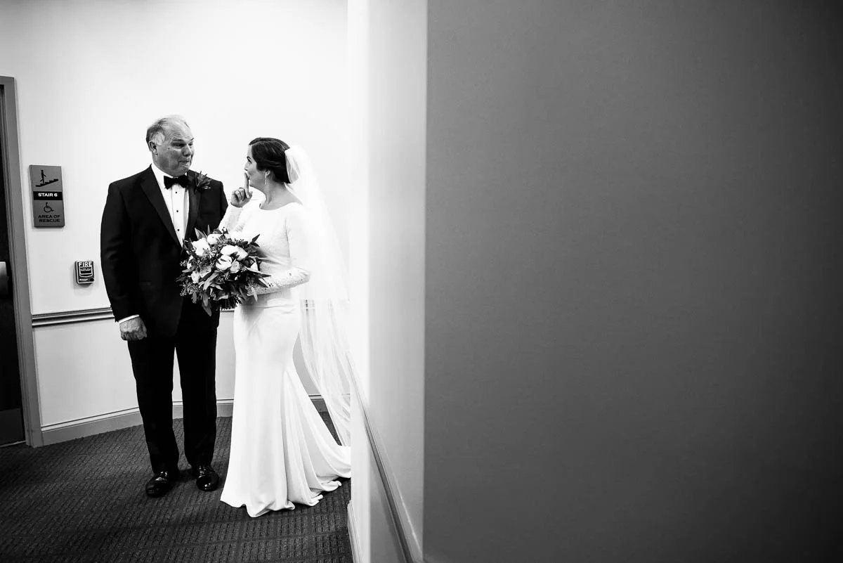 Father and the bride share a moment before the ceremony at St. James Chapel Chicago. 
