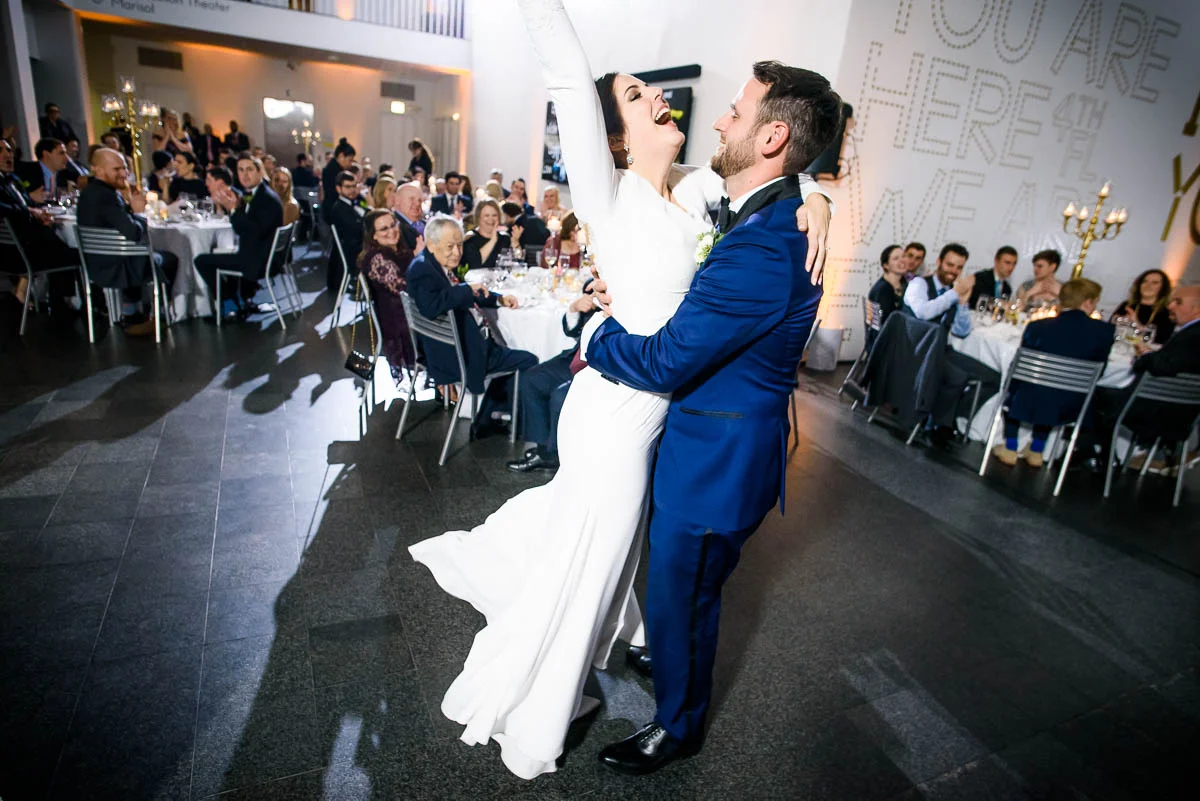 Bride & groom share a moment after their first dance during a winter wedding at the MCA Chicago. 