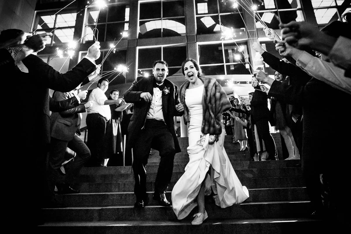 Sparkler exit outside the MCA Chicago for a winter wedding. 