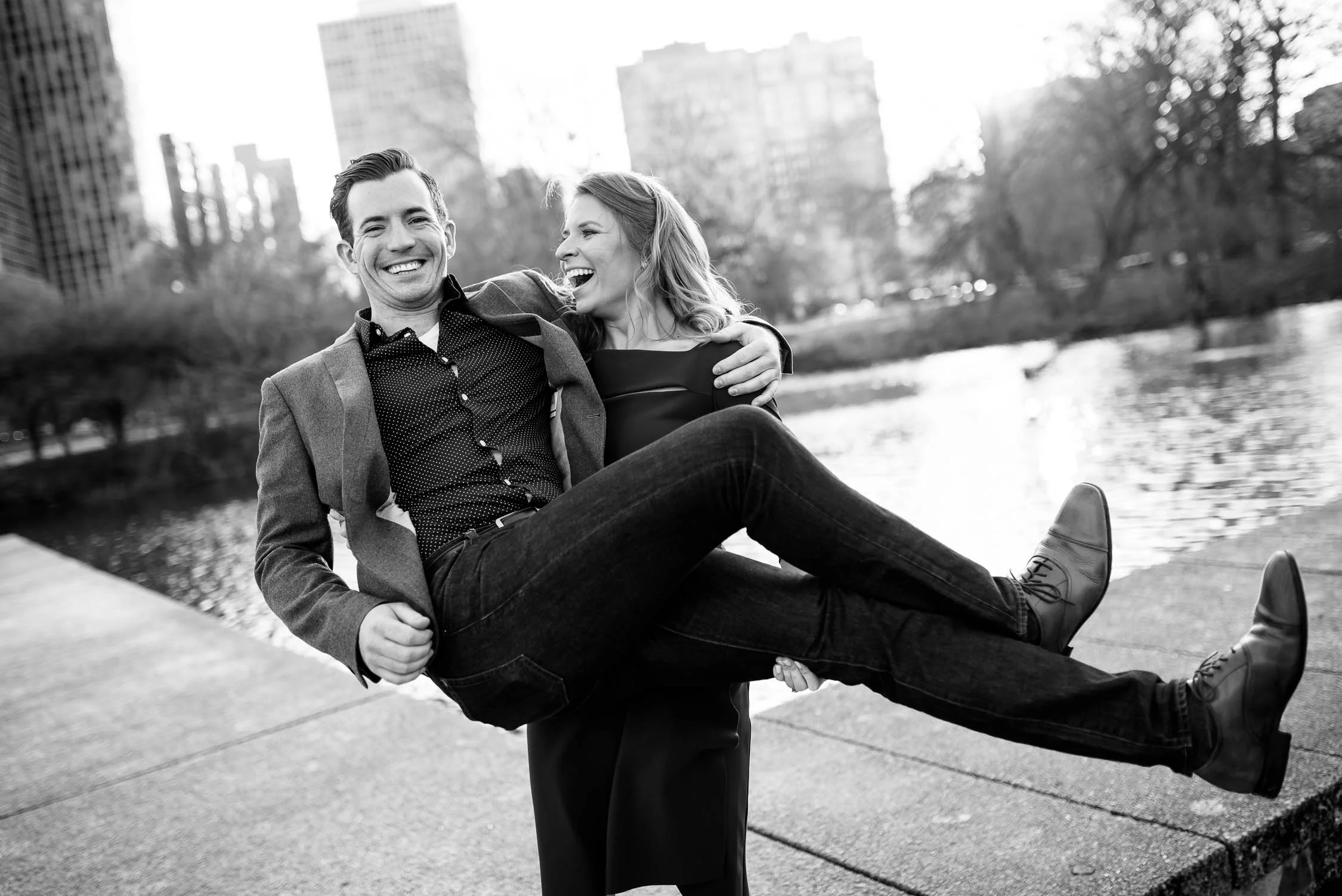 Hilarious fun engagement photo outside the nature museum in Lincoln Park Chicago. 