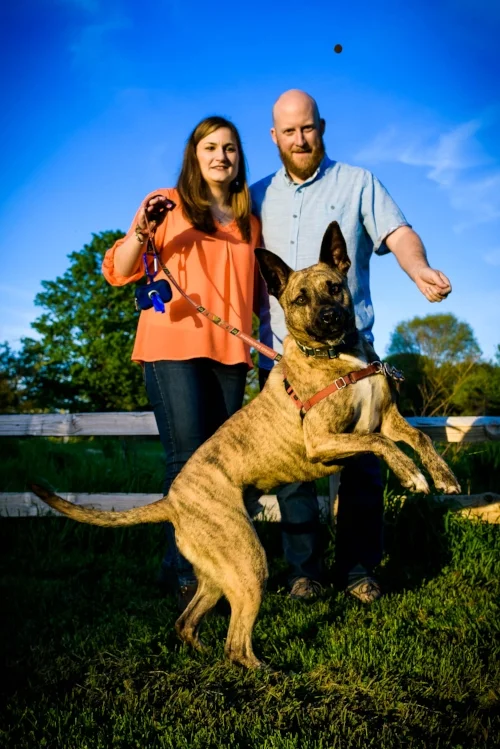 Couple with their dog during a Montrose Harbor Engagement session in Chicago. 