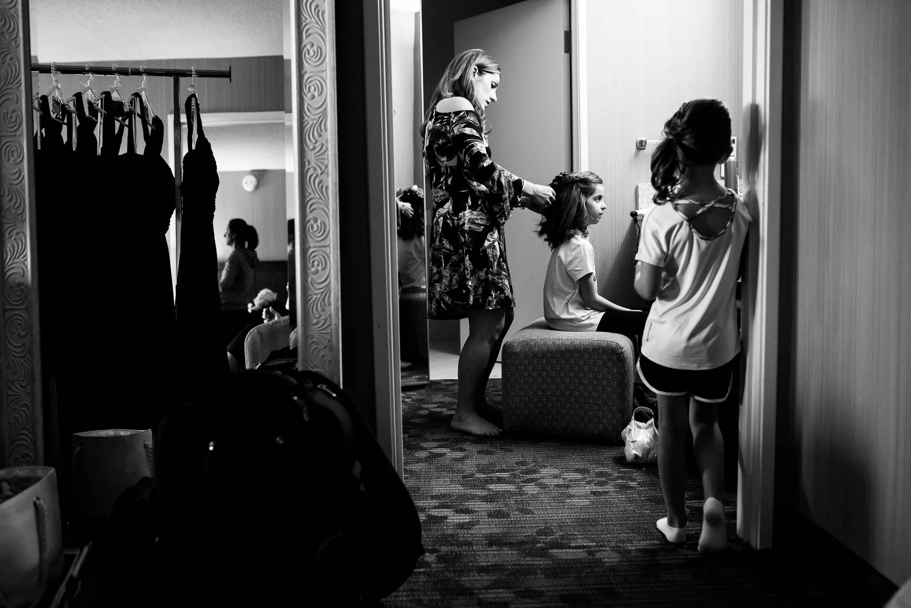 Flower girls getting ready before a St. Charles Country Club wedding. 