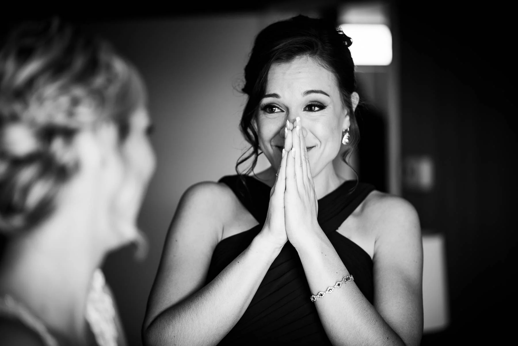 Maid of honor reacts emotionally to seeing the bride before her St. Charles Country Club wedding. 