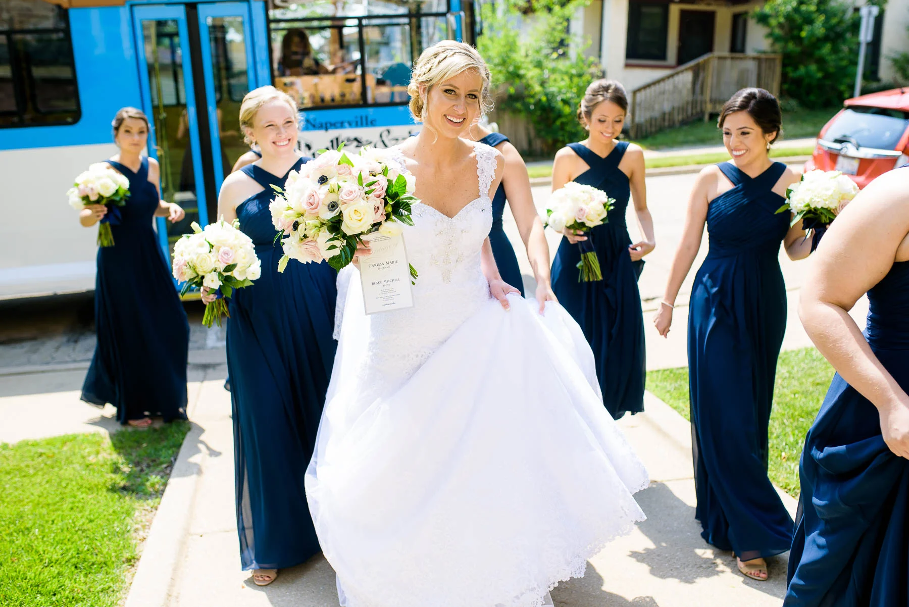 Bride and bridesmaid arrives for her wedding ceremony at Baker Memorial United Methodist Church. 