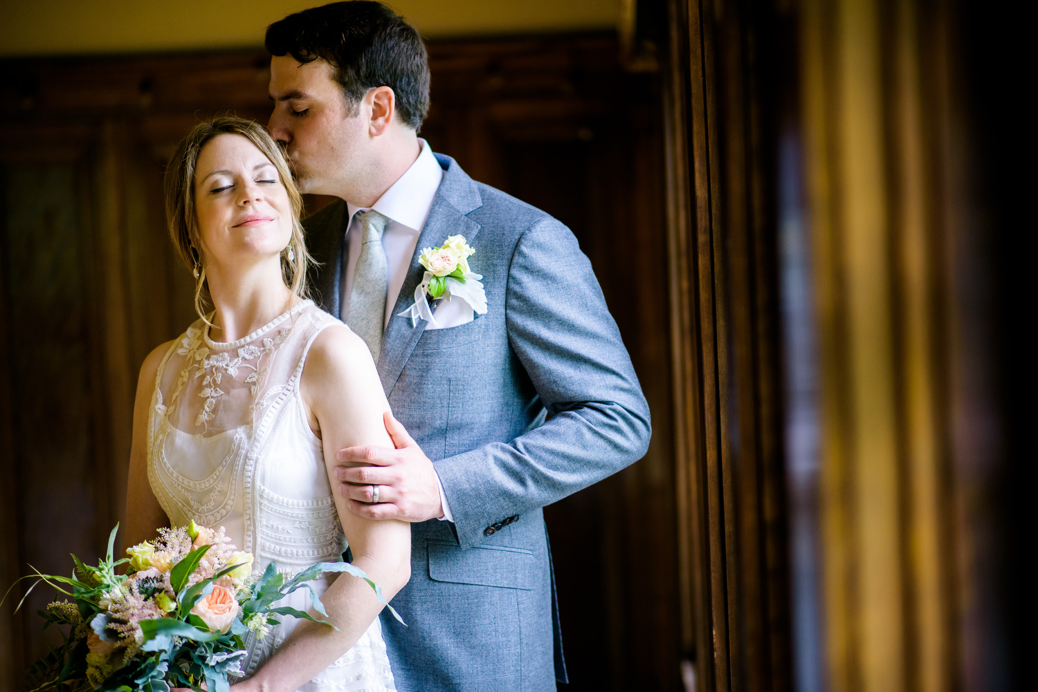 Indoor portrait of the bride and groom during a Cheney Mansion wedding in Oak Park. 