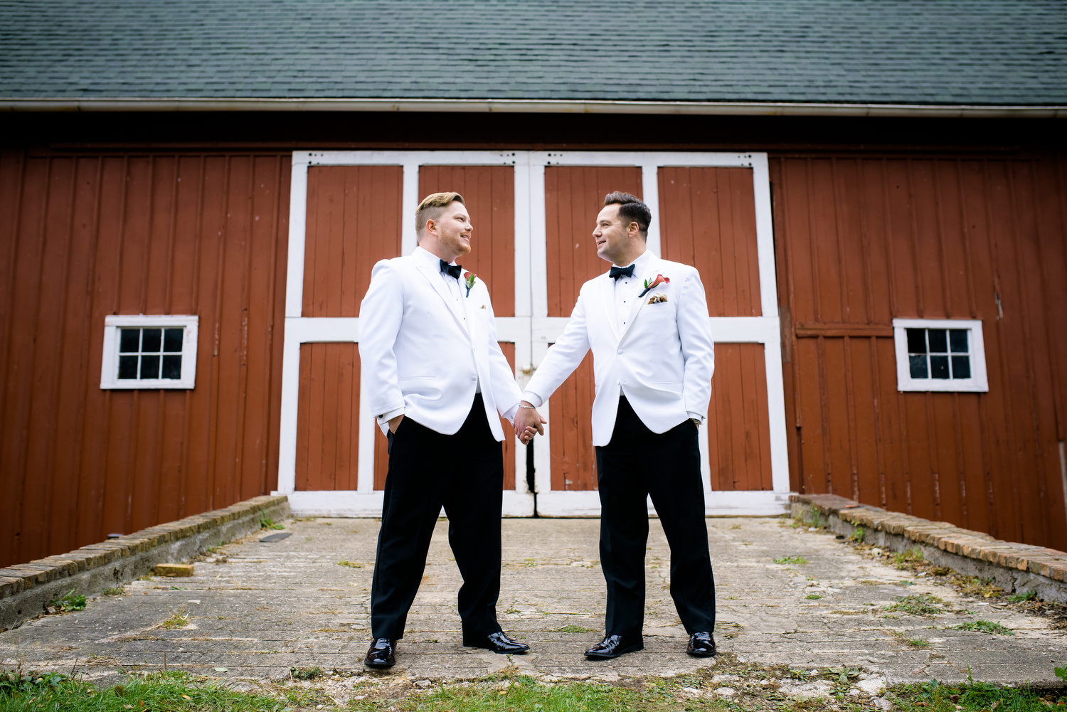 Wedding portrait of the grooms during a same sex wedding at Heritage Prairie Farm.