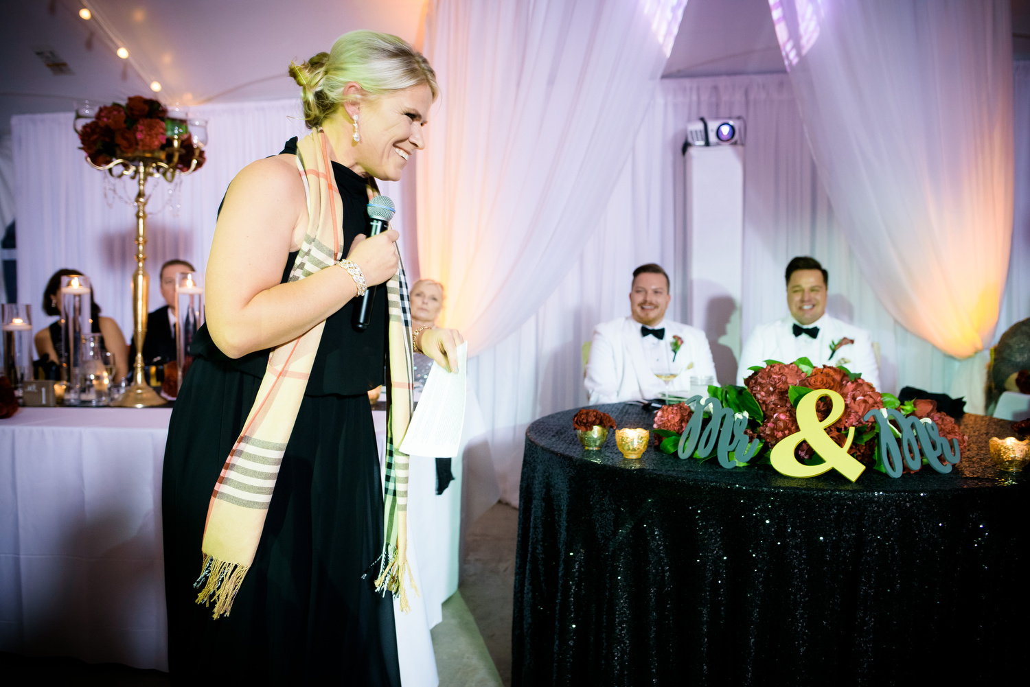 Toasts during a same sex wedding at Heritage Prairie Farm.