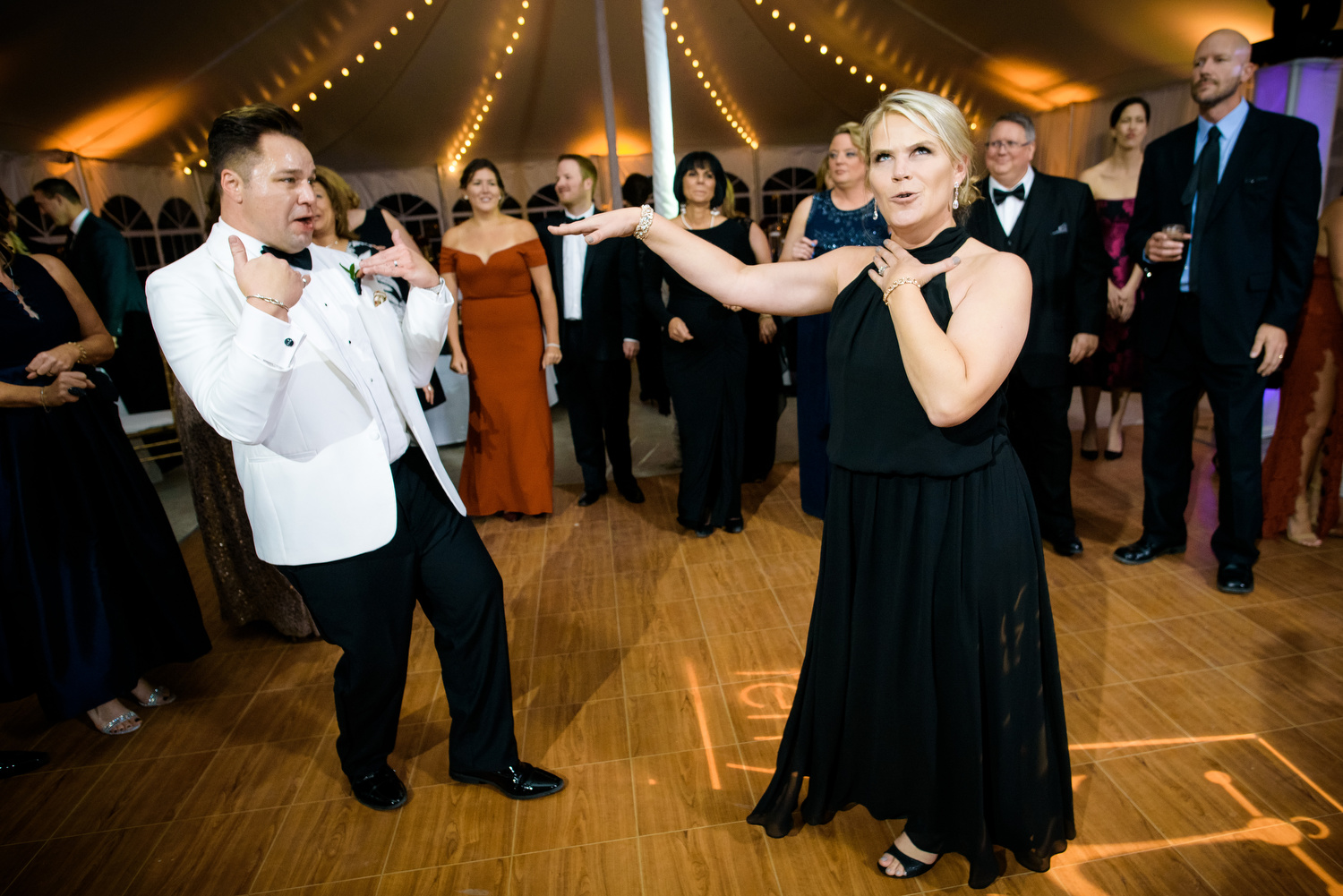 Funny dance floor moment during a wedding at at Heritage Prairie Farm.