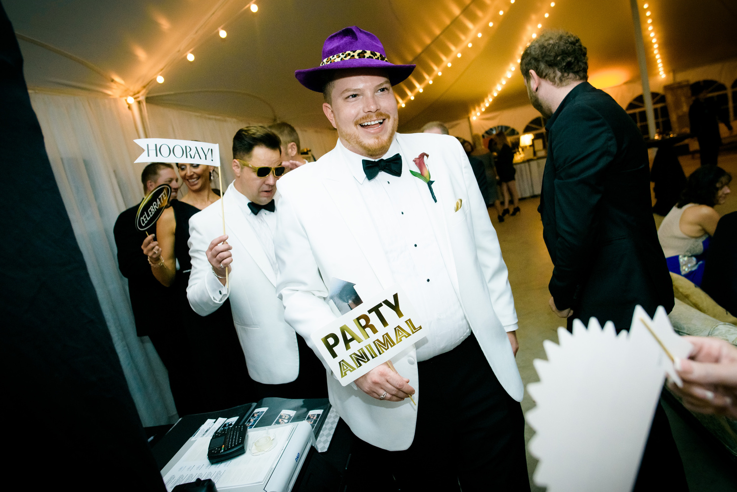Funny reception moment during a wedding at at Heritage Prairie Farm.