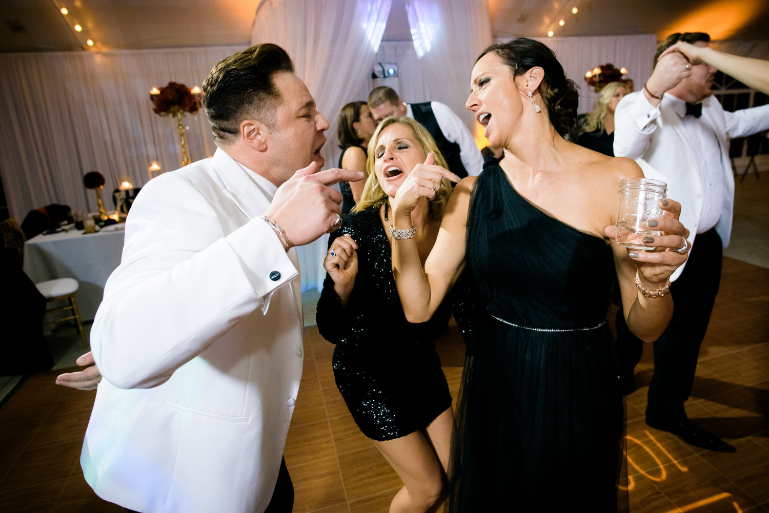 Funny dance floor moment during a wedding at at Heritage Prairie Farm.