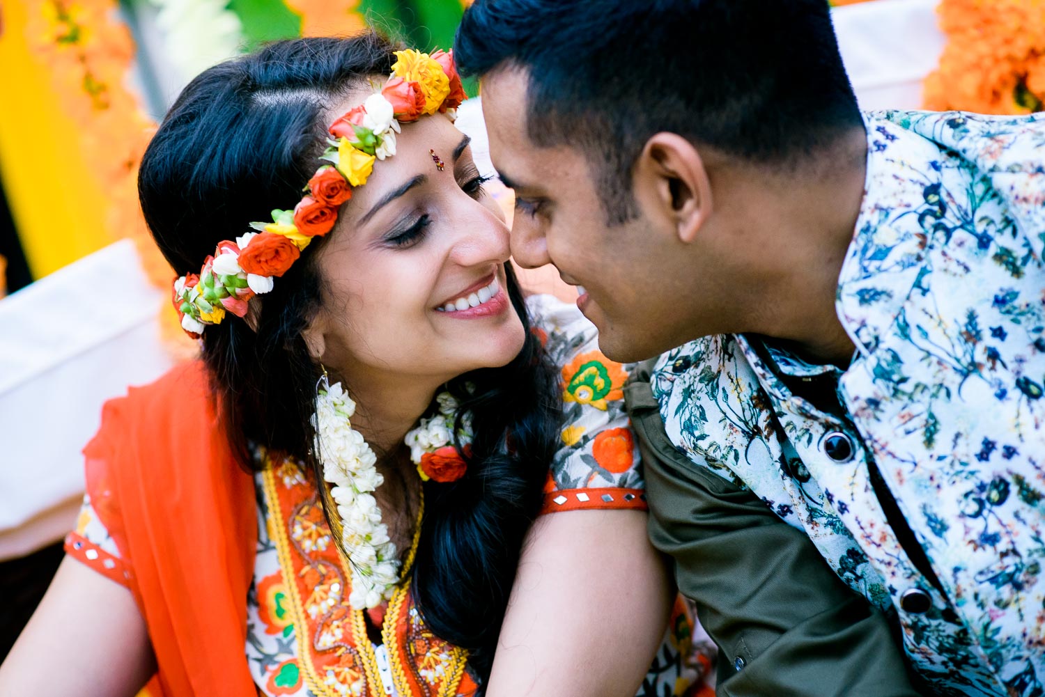 Bride and groom during an Indian wedding mehndi in South Barrington, Illinois.