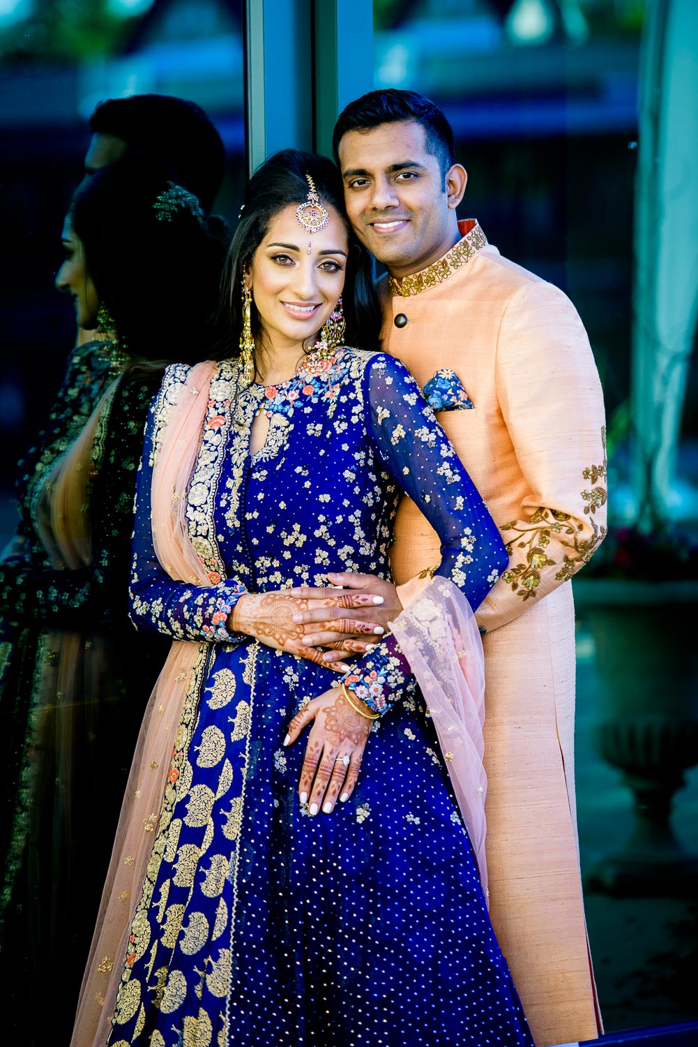 Bride and groom during their Indian wedding sangeet at Stonegate Banquets in Hoffman Estates. 