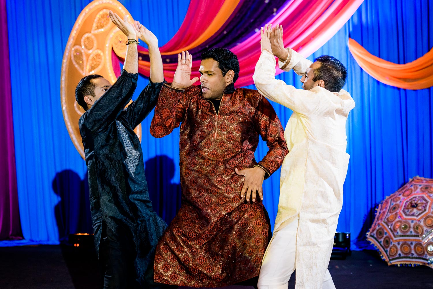 Groomsmen dance during an Indian wedding sangeet at Stonegate Banquets in Hoffman Estates.