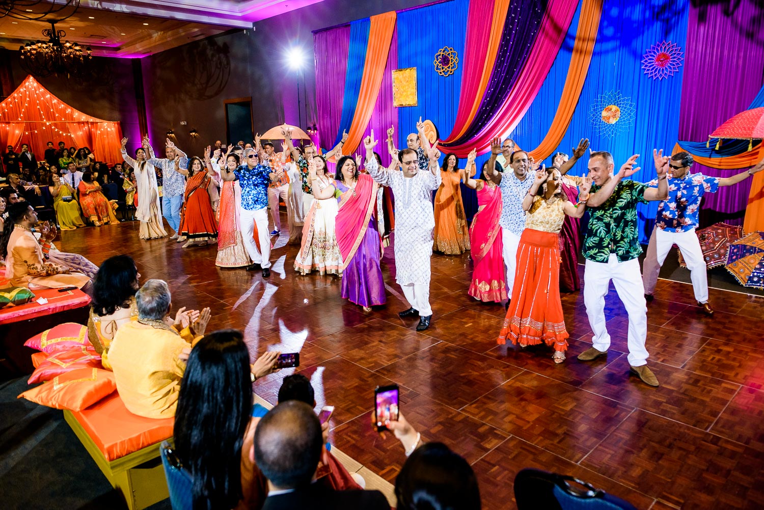 Aunts and uncles performance during an Indian wedding sangeet at Stonegate Banquets in Hoffman Estates.