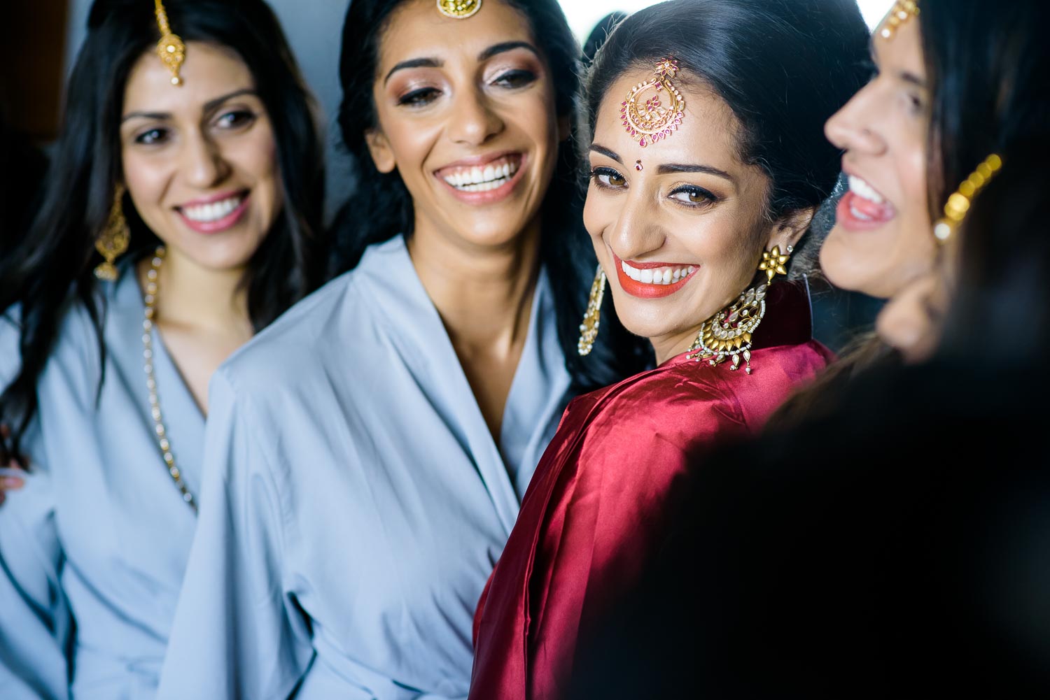 Bride and bridesmaid during a Renaissance Schaumburg Convention Center Indian wedding.