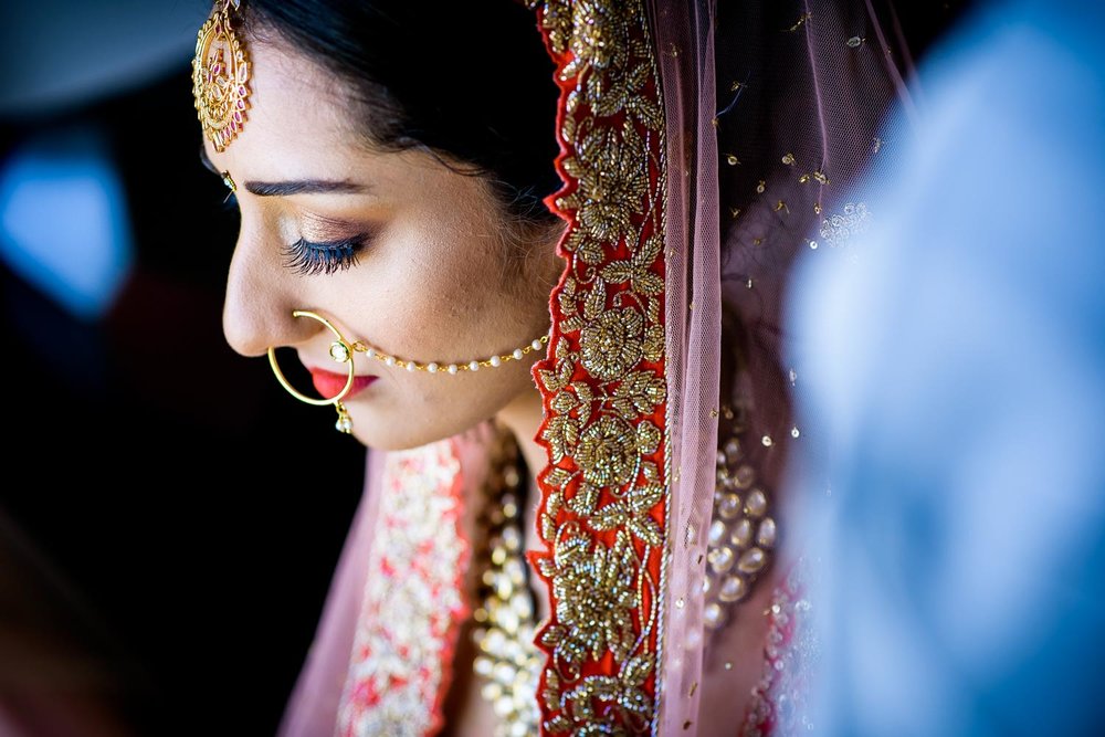 Bride getting ready before a Renaissance Schaumburg Convention Center Indian wedding.