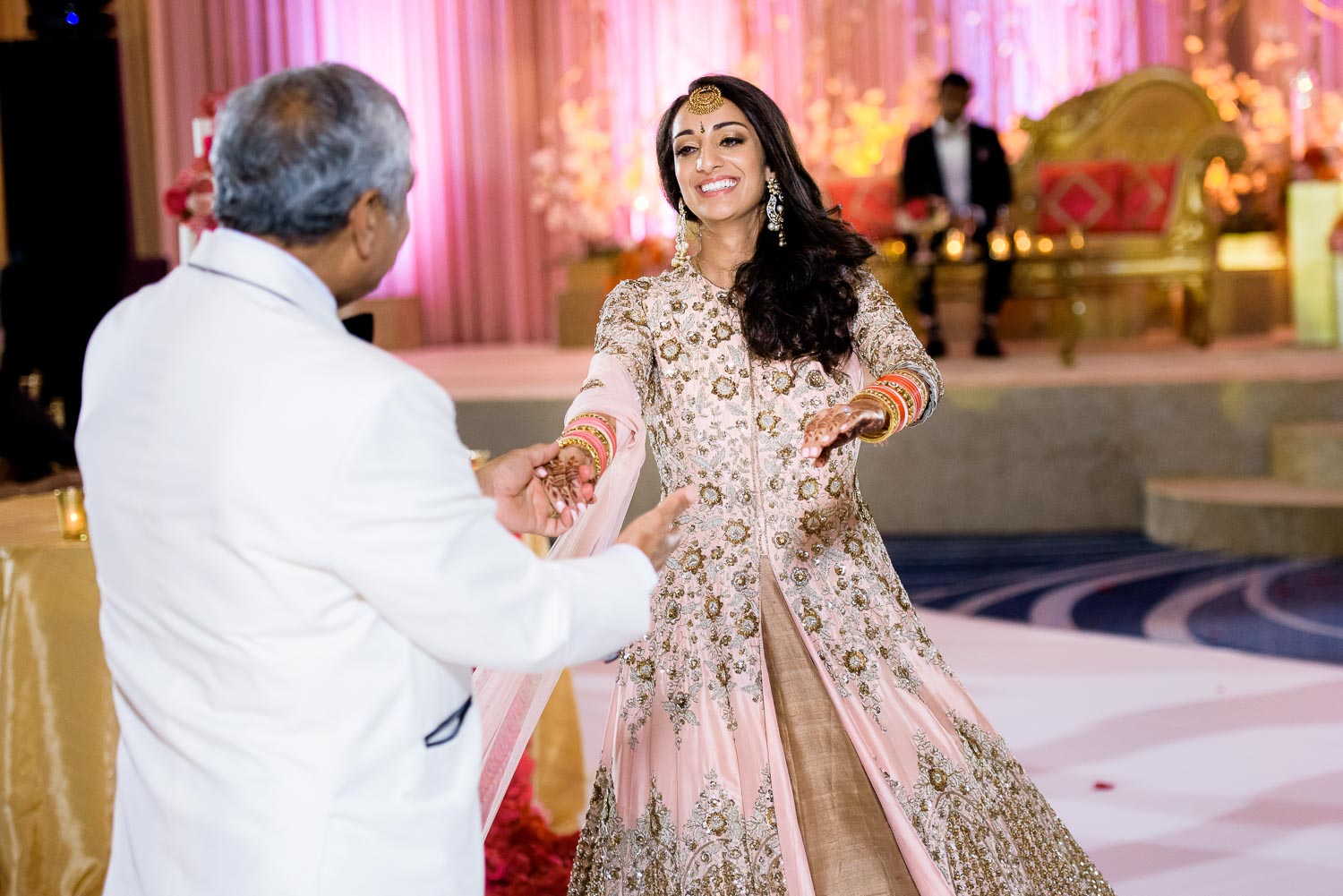 Father daughter dance during a Renaissance Schaumburg Convention Center Indian wedding reception.