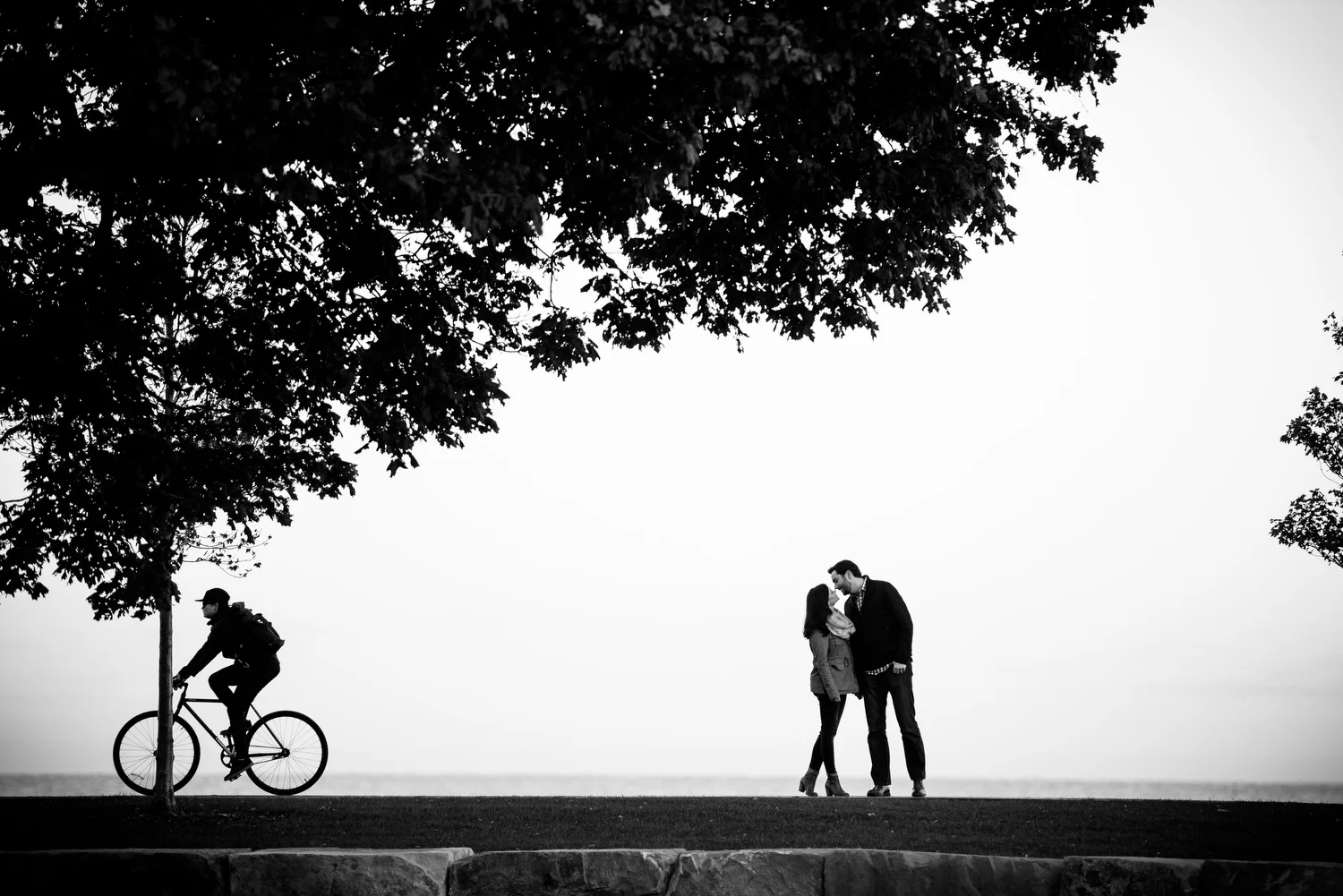 Creative sunset lakefront Chicago engagement photo.