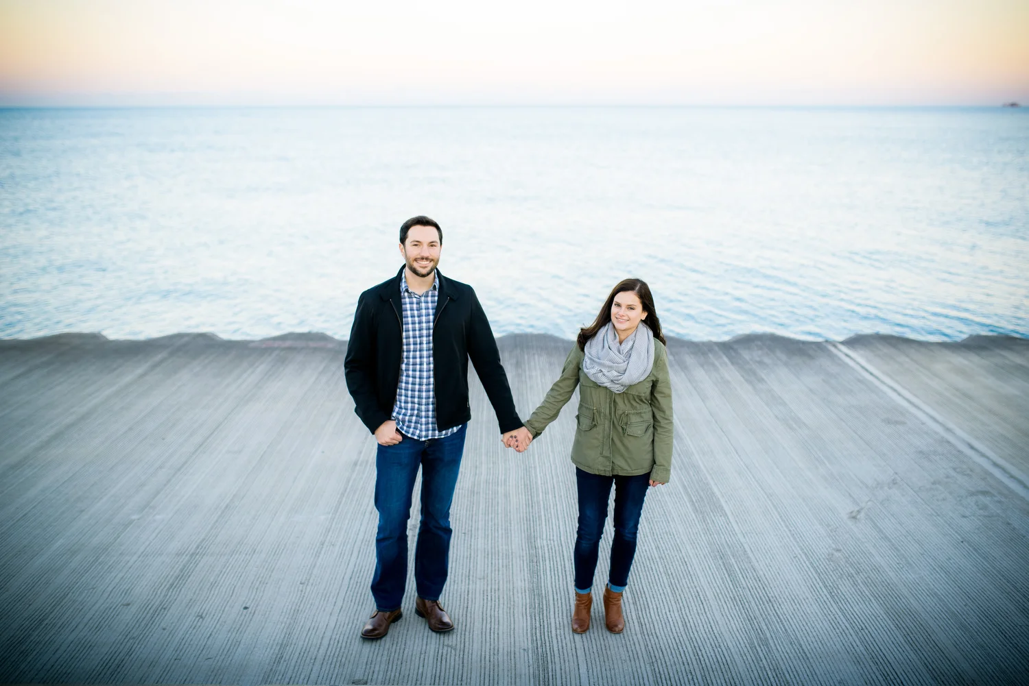 Creative sunset lakefront Chicago engagement photo.