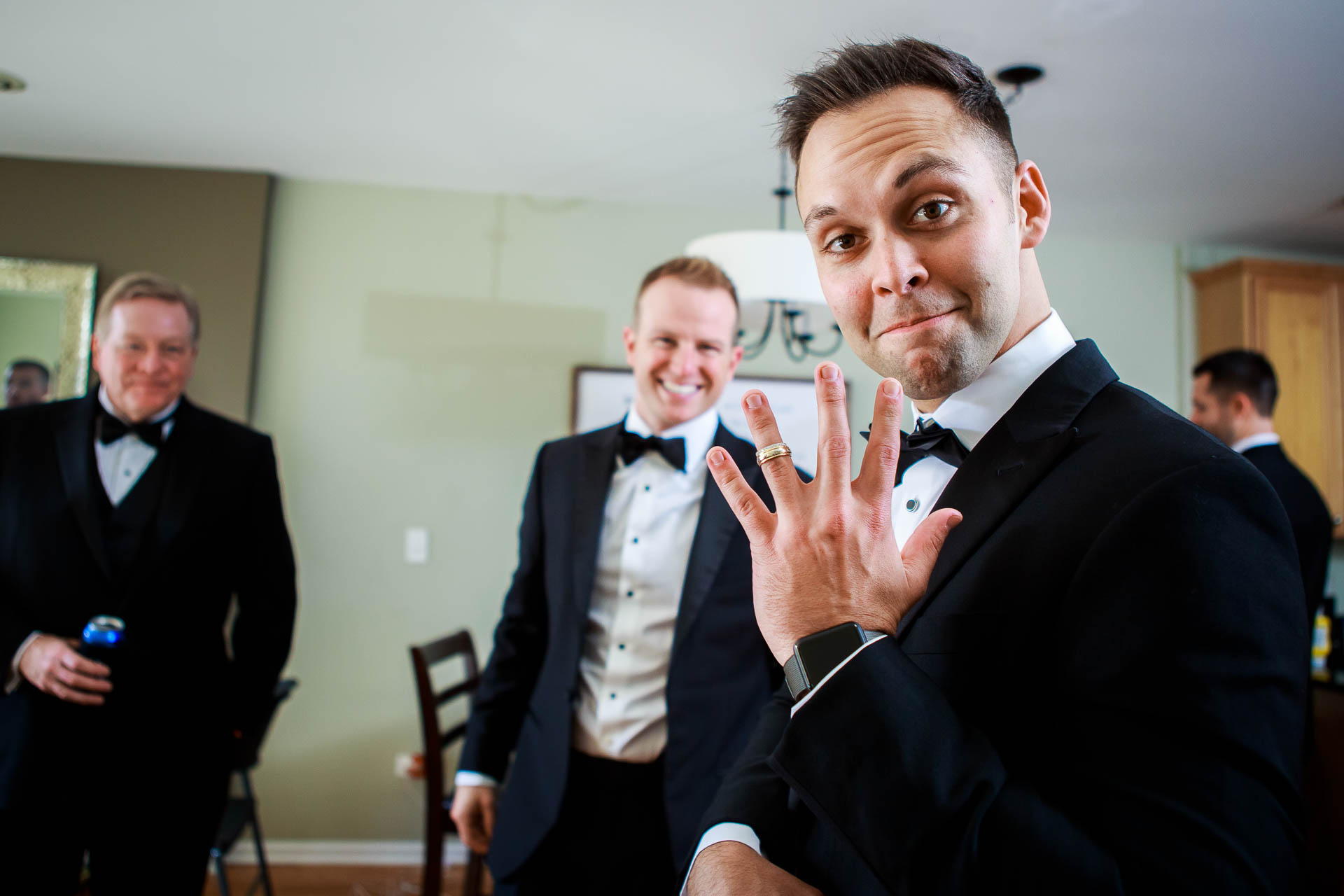 Best man holds the rings during a Mid America Club wedding Chicago.