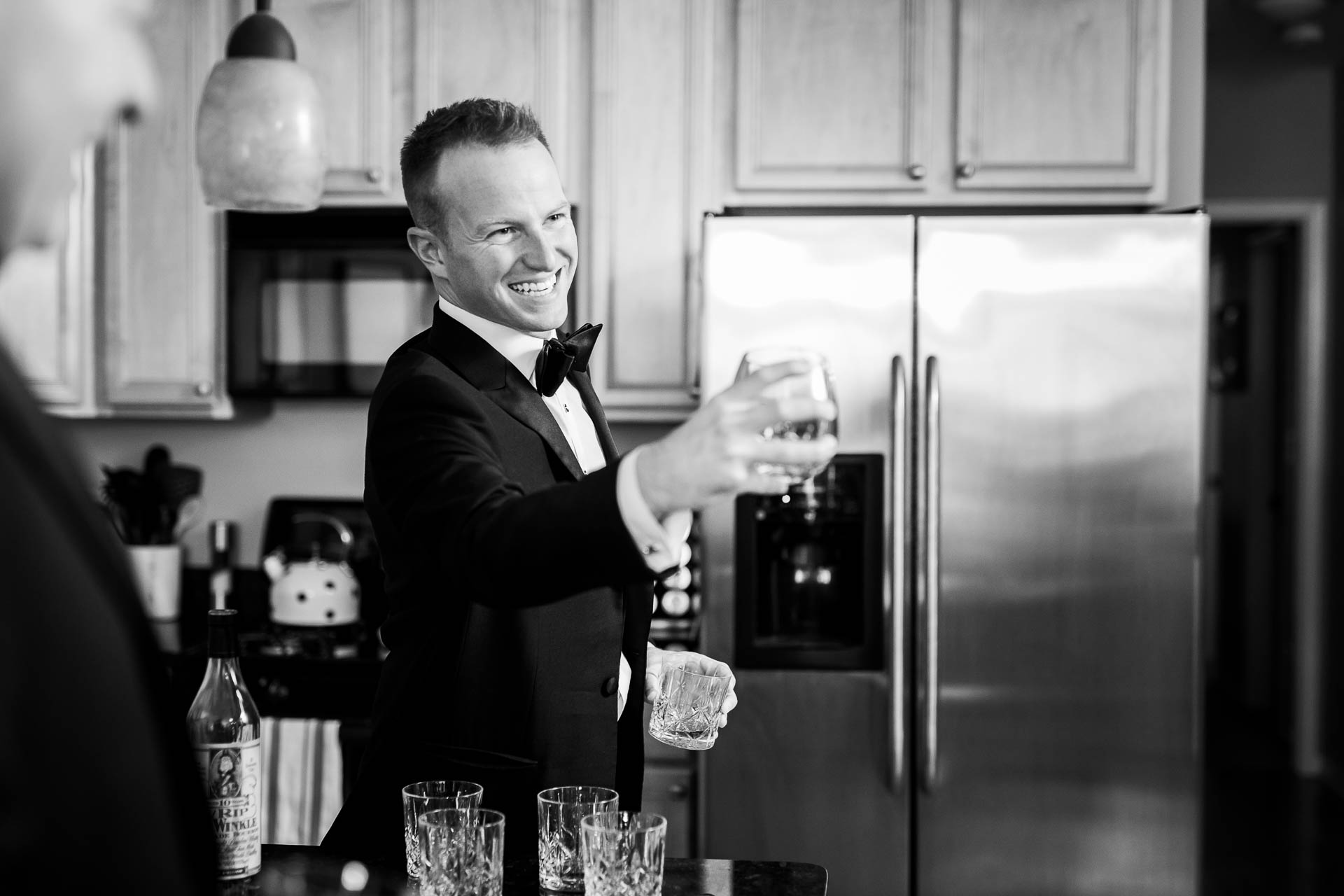 Groom gives a toast while getting ready before a Mid America Club wedding Chicago.