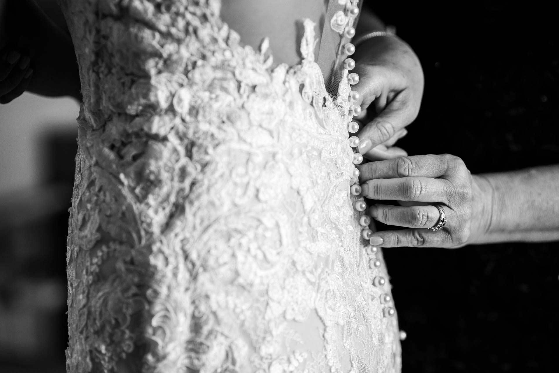 Bride getting her dress on before a Mid America Club wedding Chicago.