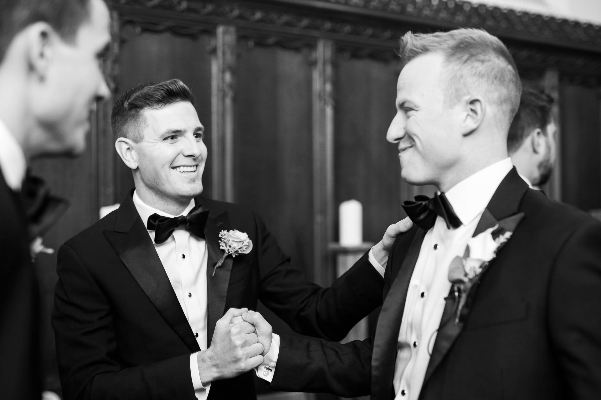 Groom shares a moment with the best man before the wedding ceremony at Fourth Presbyterian Church in Chicago.