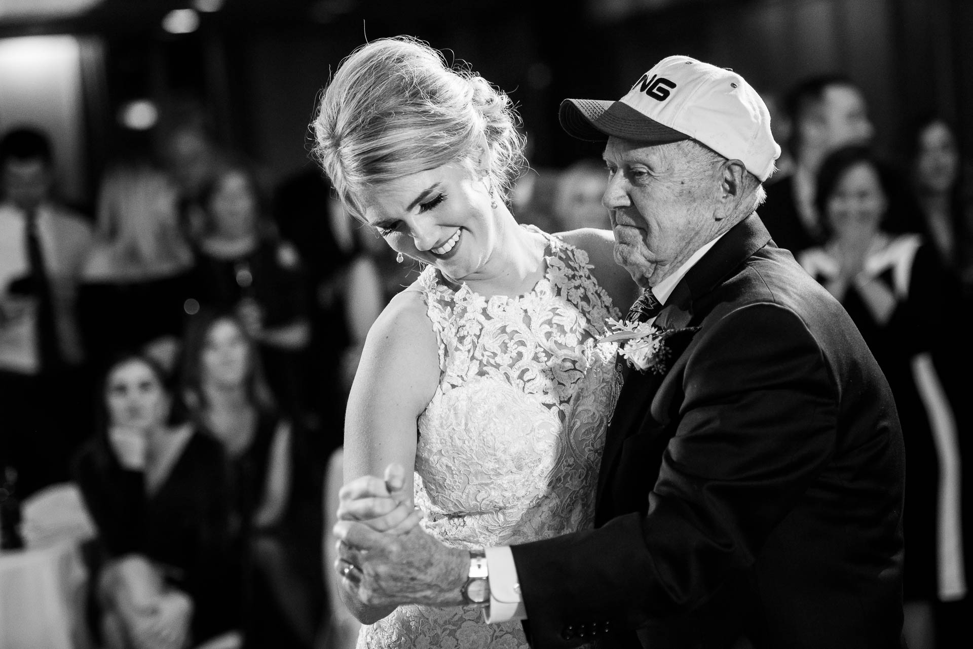 Bride and grandpa during a wedding reception at the Mid America Club in Chicago. 