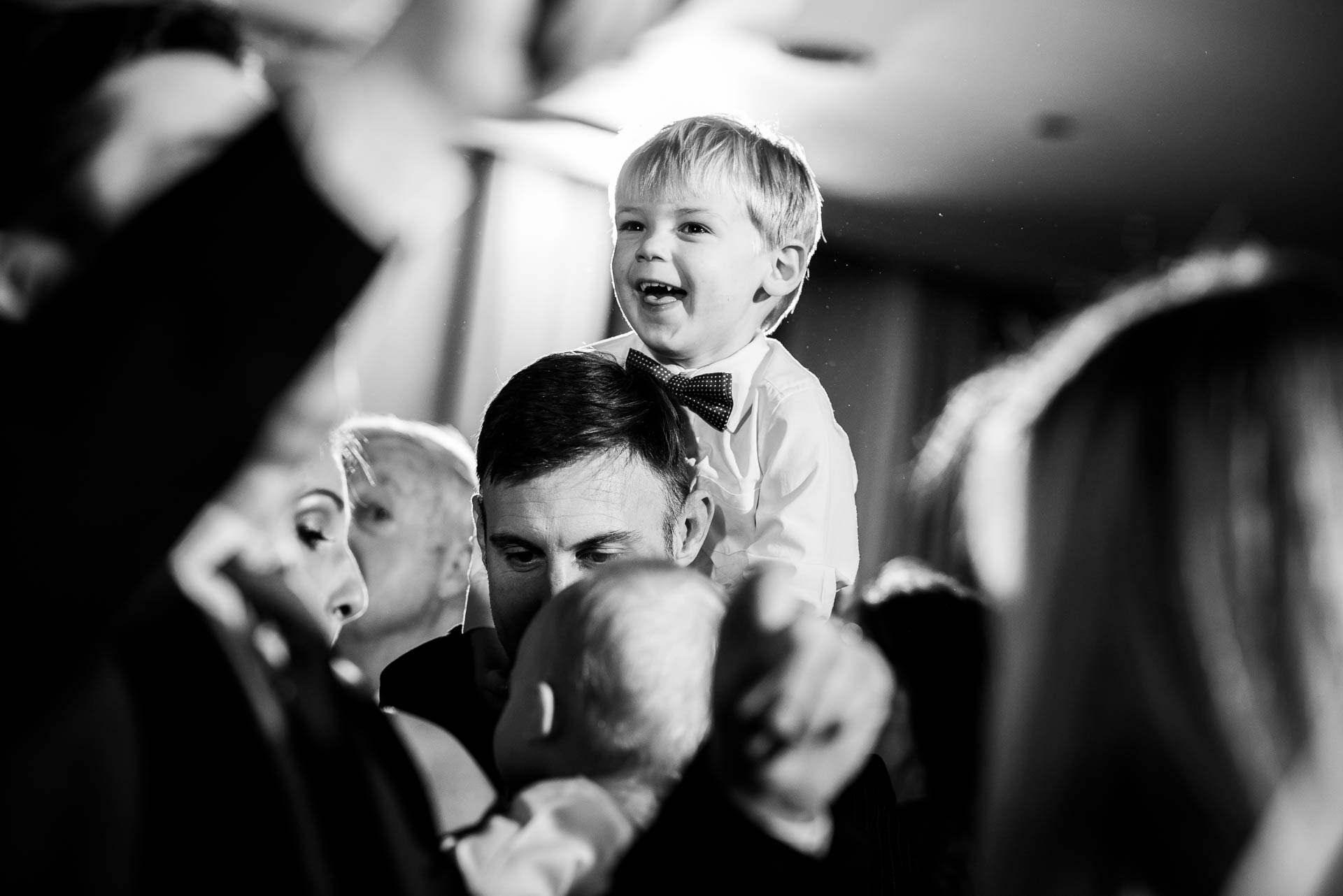 Ring bearer on the dance floor during a wedding reception at the Mid America Club in Chicago.