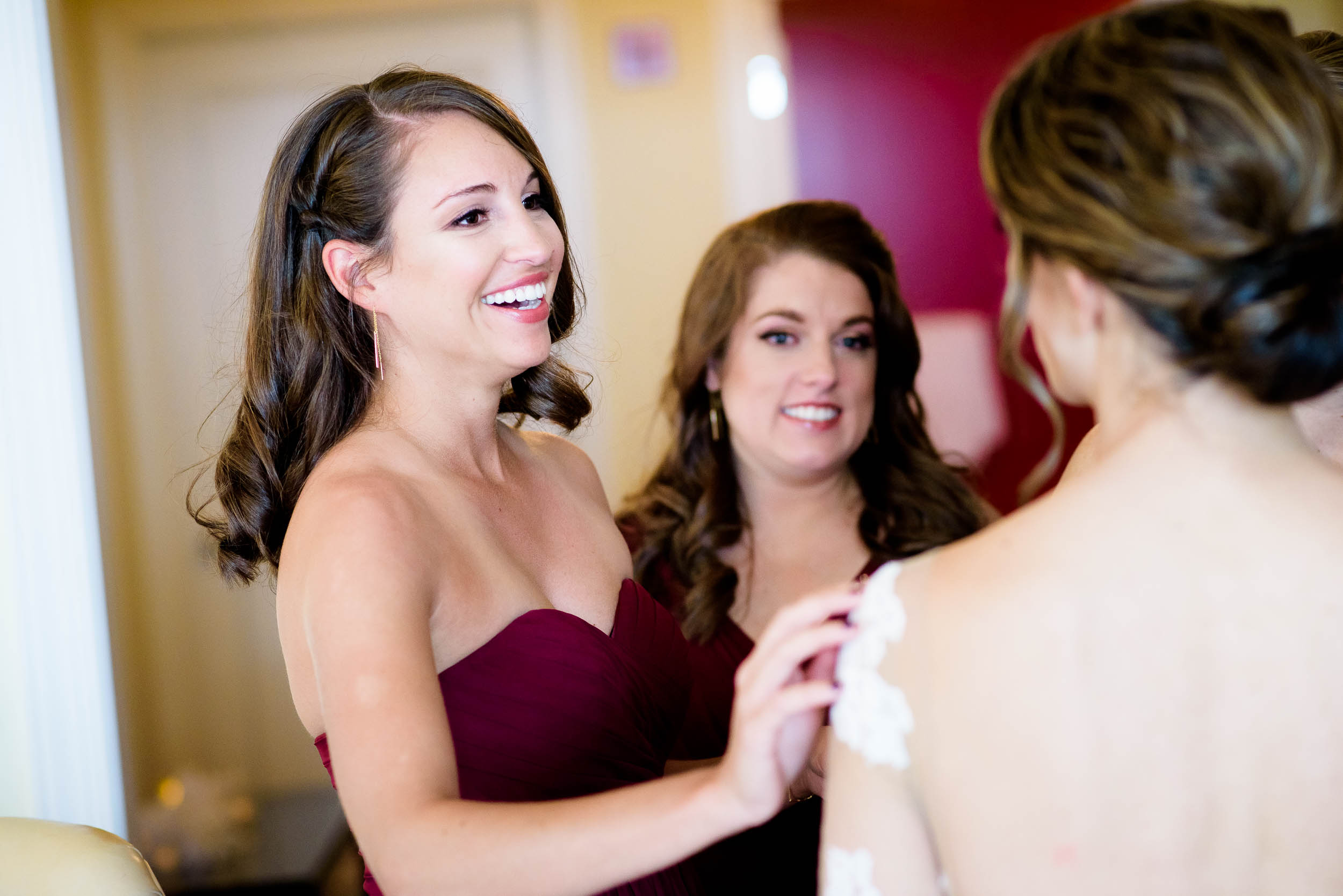Bridesmaid react to seeing the bride during a Blackstone Chicago wedding.