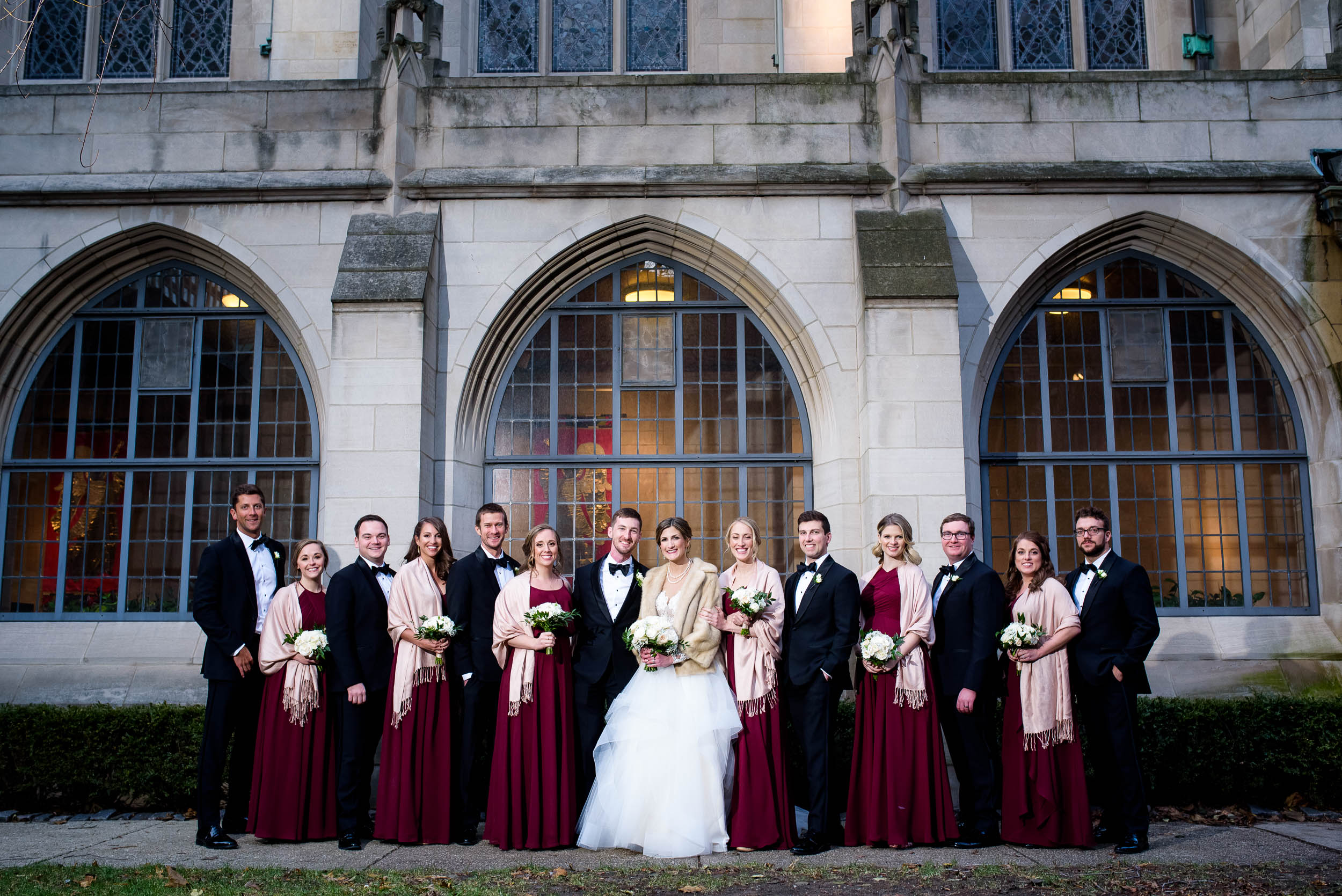 Wedding party courtyard portrait during a Fourth Presbyterian Church wedding.