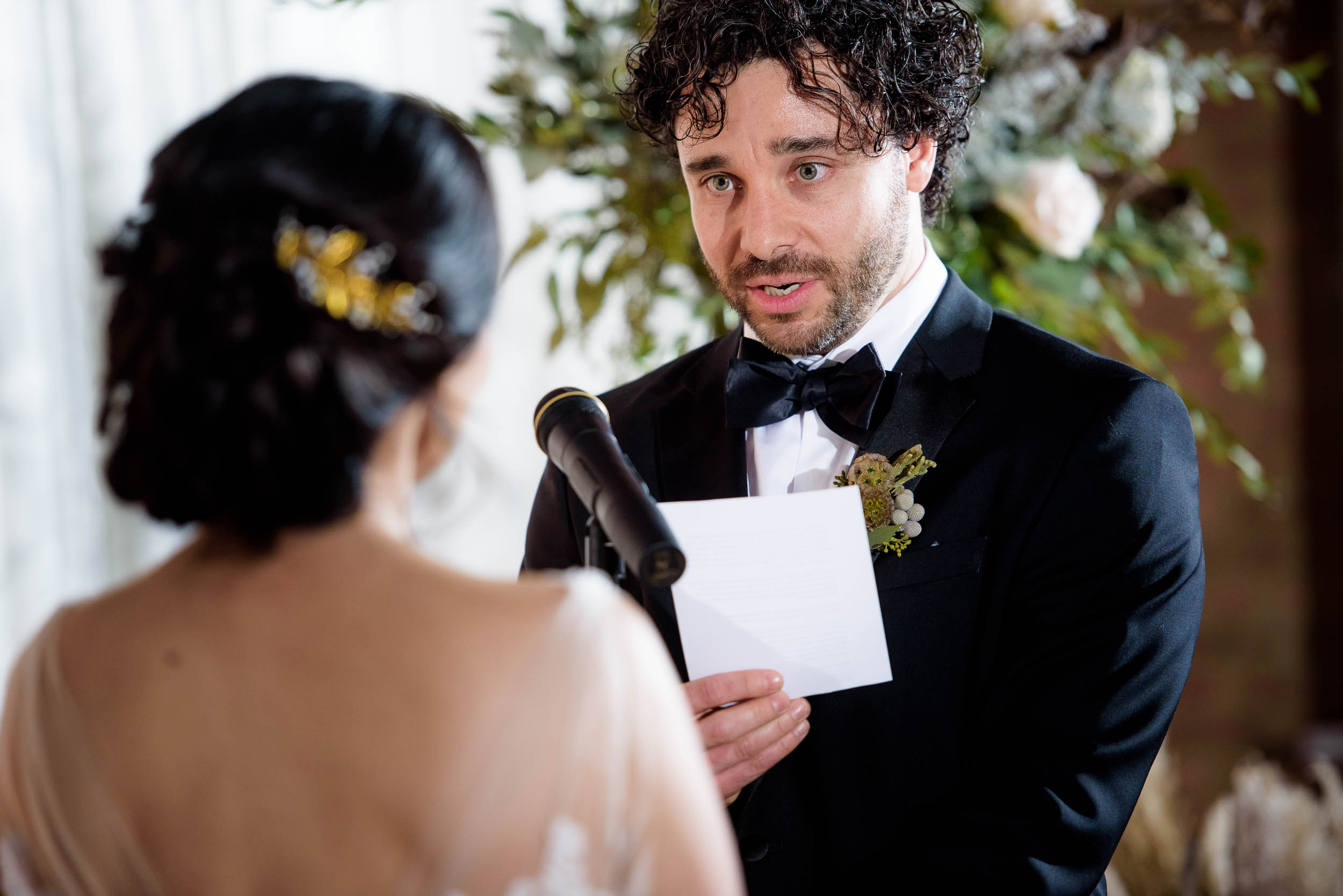 Groom reads vows during his Loft on Lake Chicago wedding.