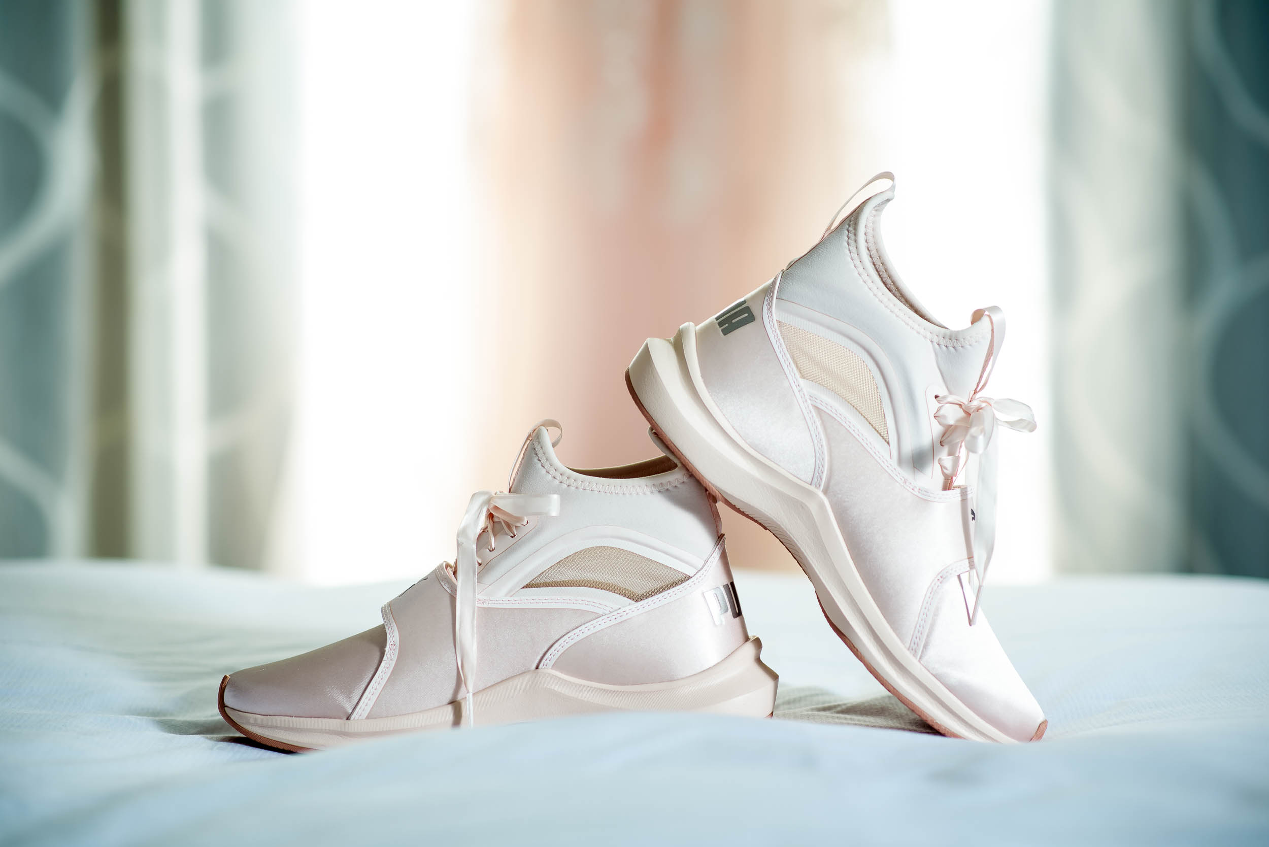 Bride's Puma wedding day shoes during an Independence Grove Chicago wedding.  