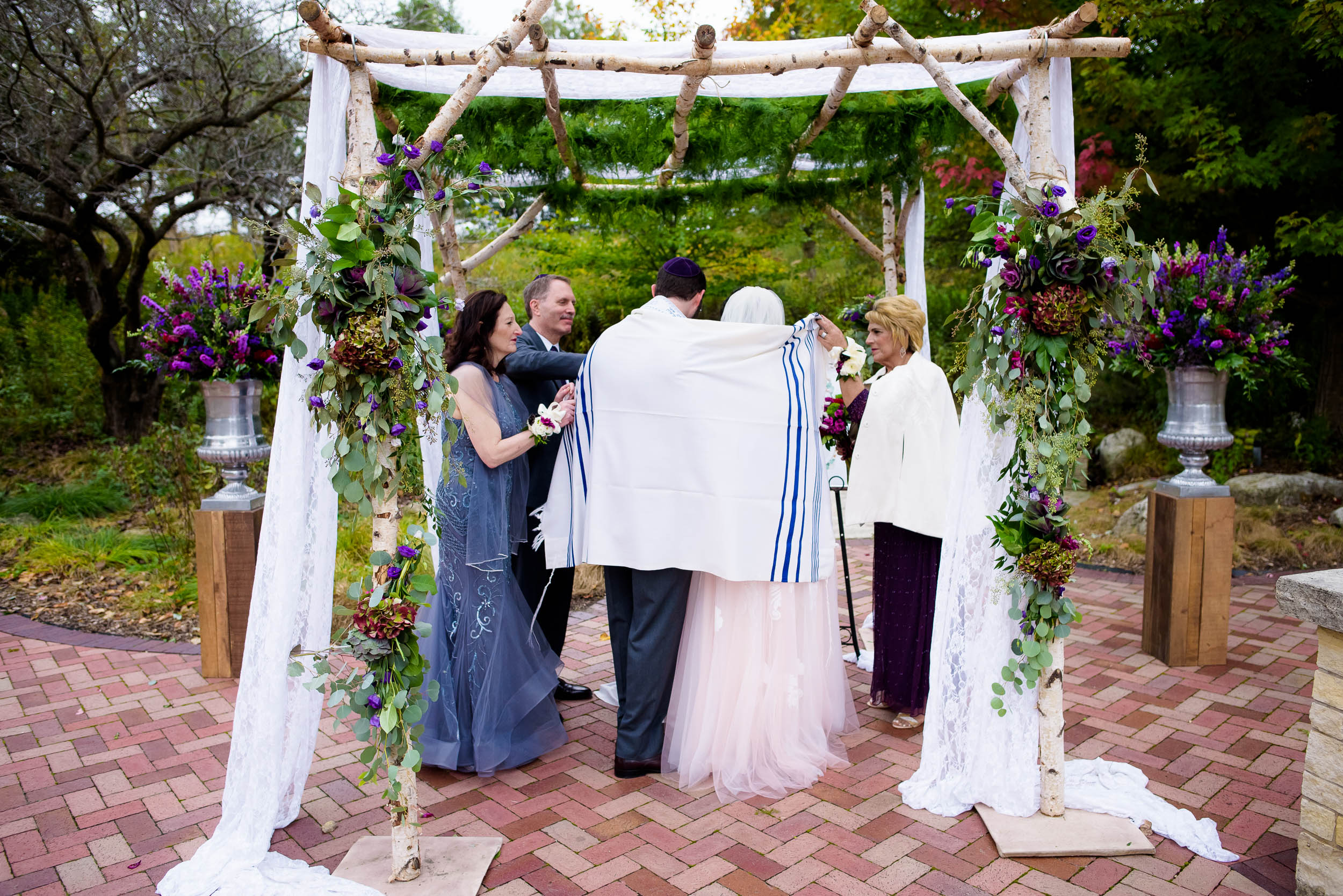 Jewish ceremony under the chuppah during an Independence Grove Chicago wedding.  