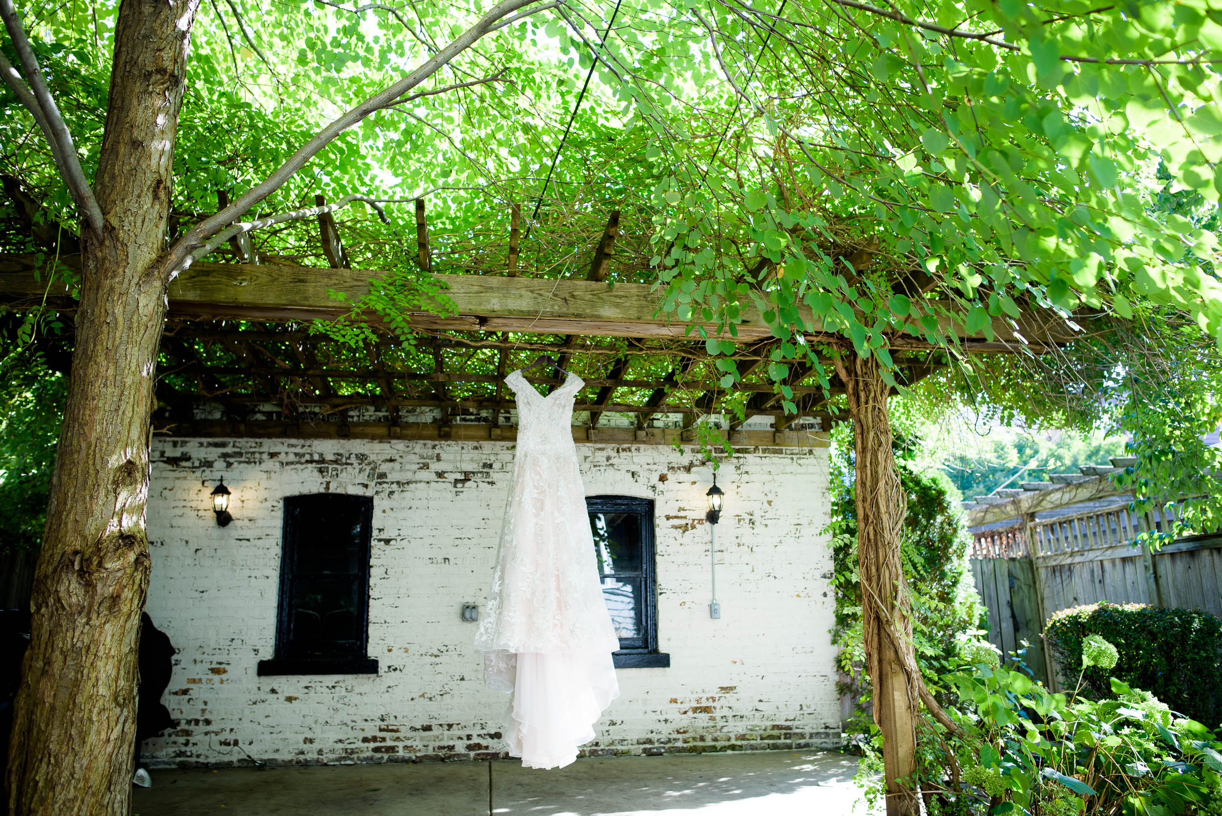 Outdoor wedding dress detail photo during a Newberry Library Chicago wedding.