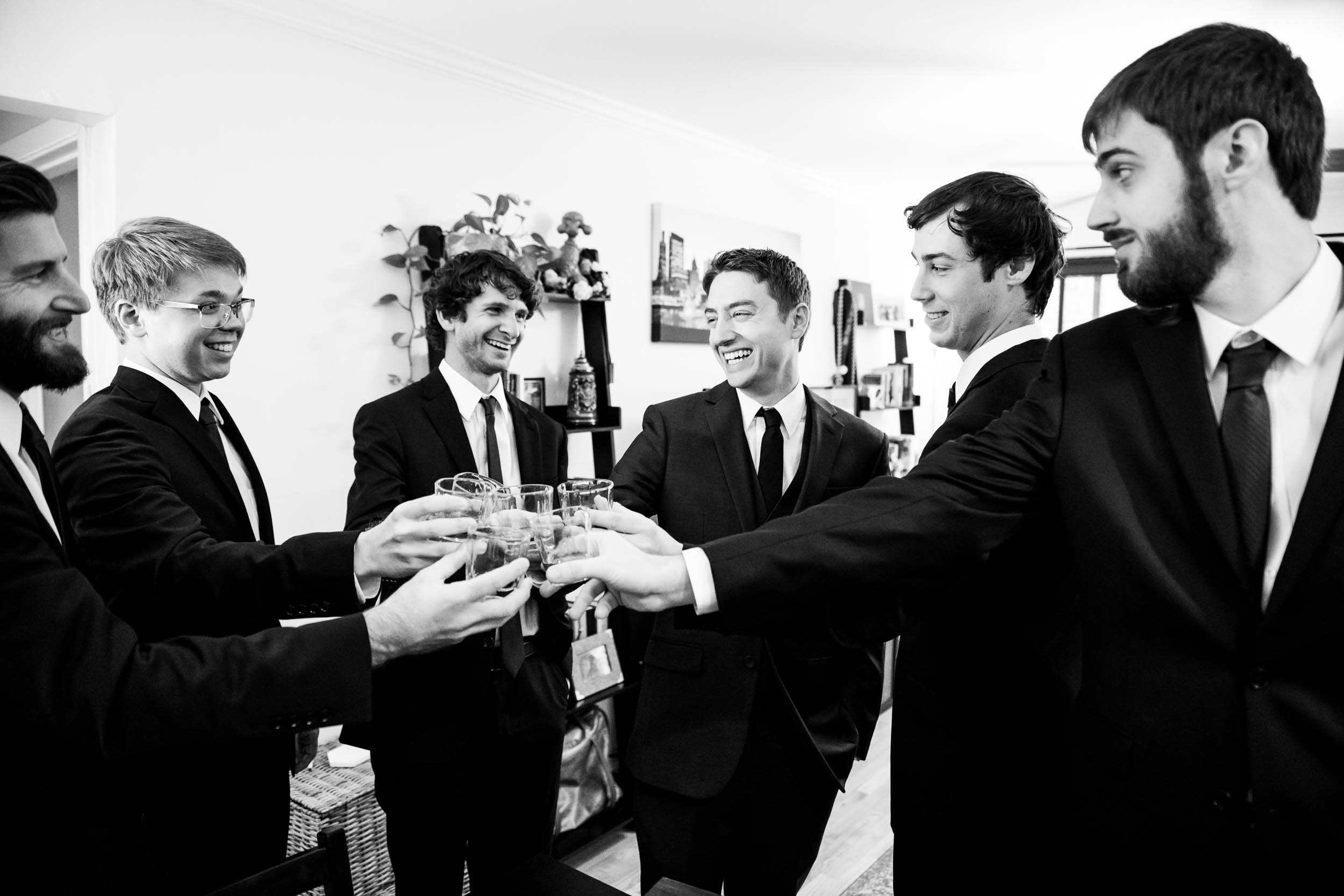 Groomsmen toast during a Newberry Library Chicago wedding.