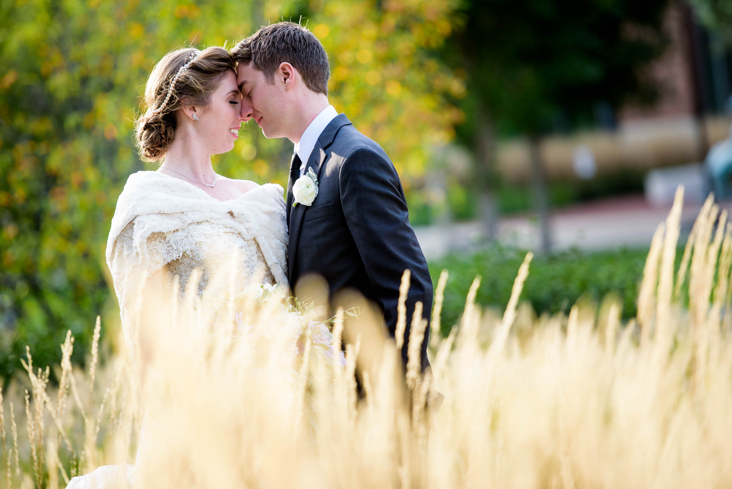 Wedding day portrait of the bride and groom on Loyola’s Campus.