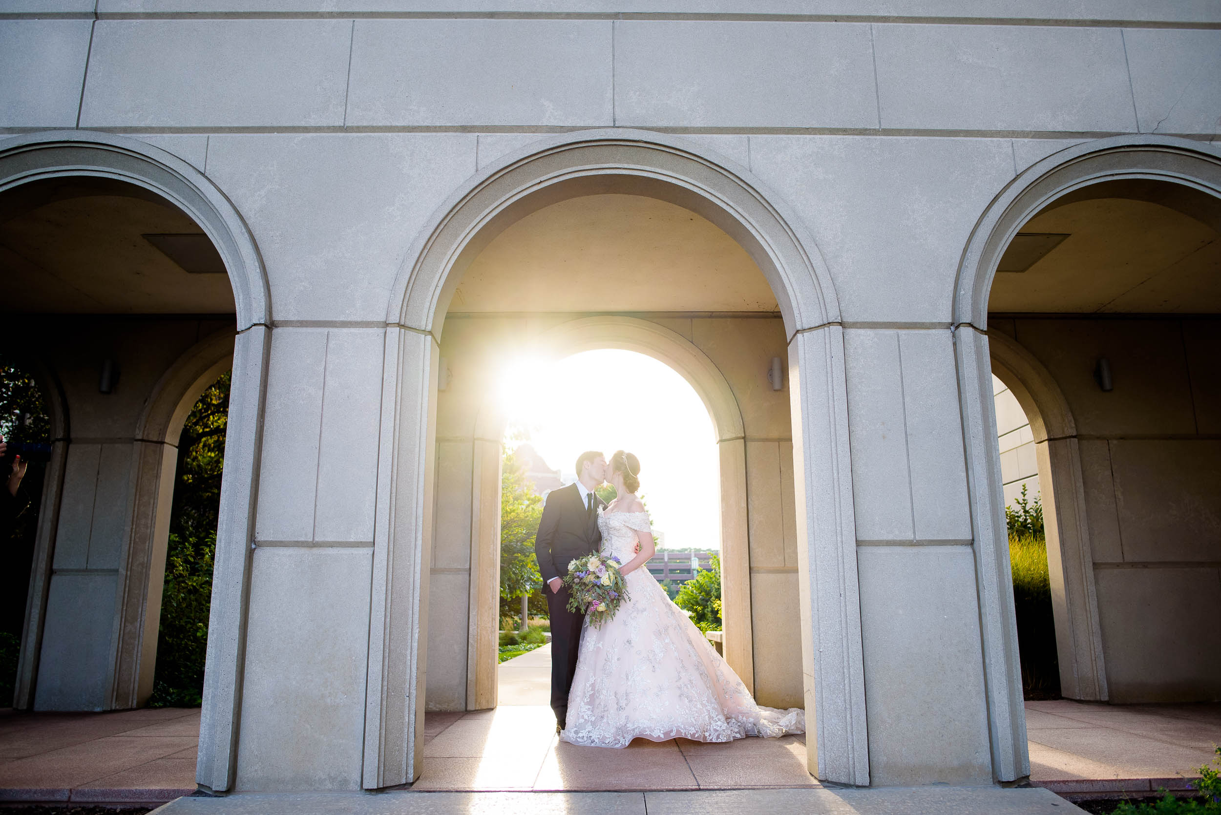 Wedding day portrait of the bride and groom on Loyola’s Campus.