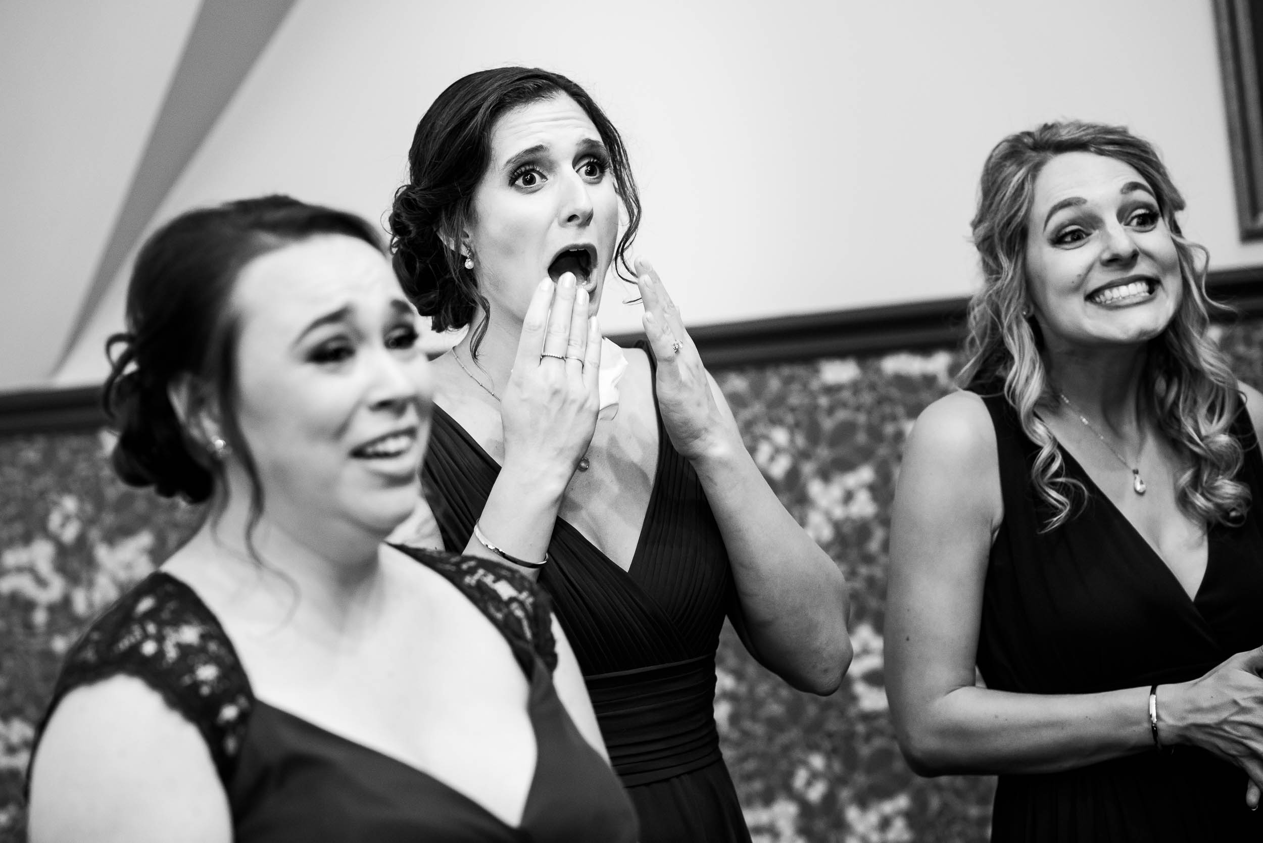 Bridesmaids react to seeing the bride during a Glessner House Chicago wedding.