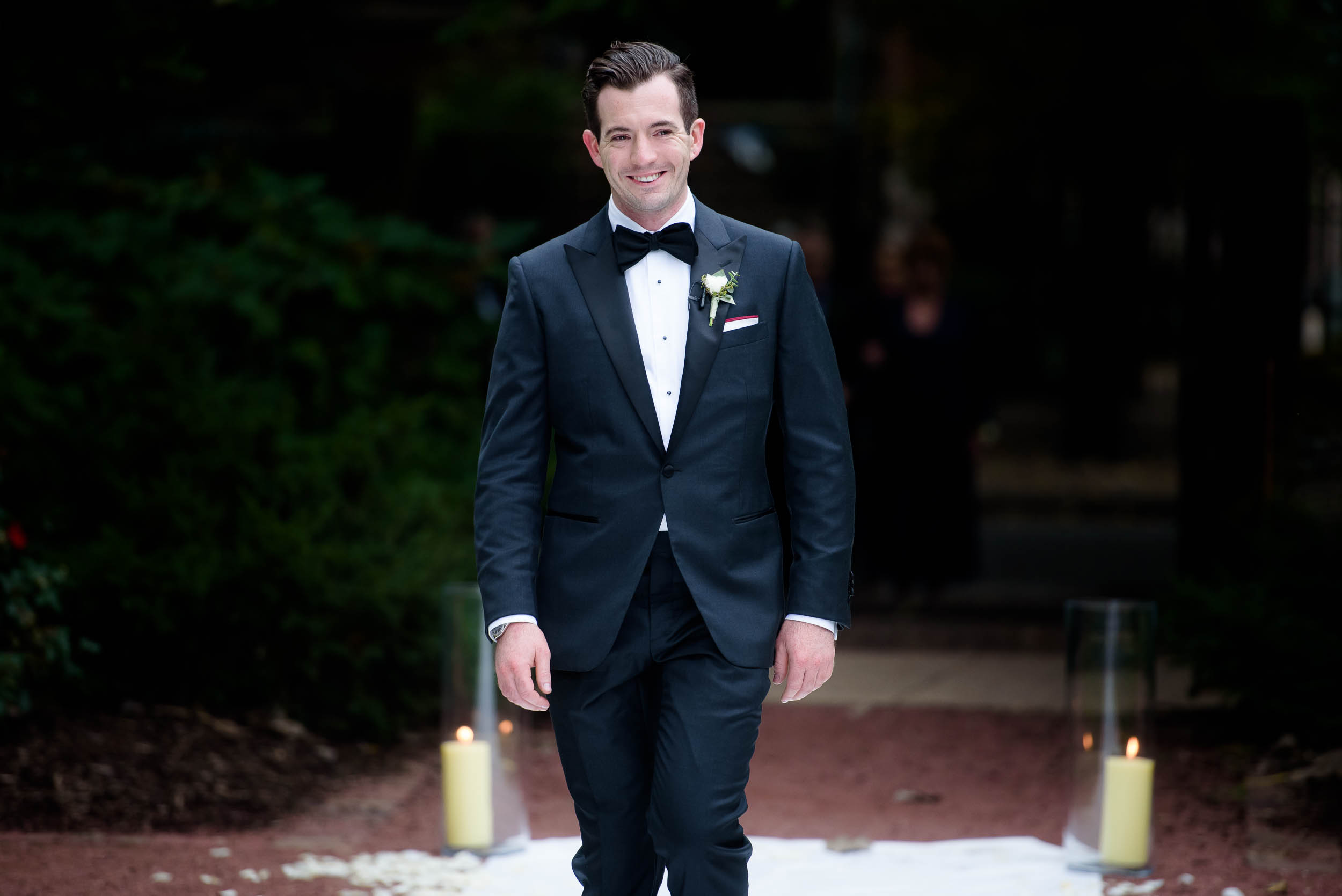 Groom walks down the aisle during a Glessner House Chicago wedding.