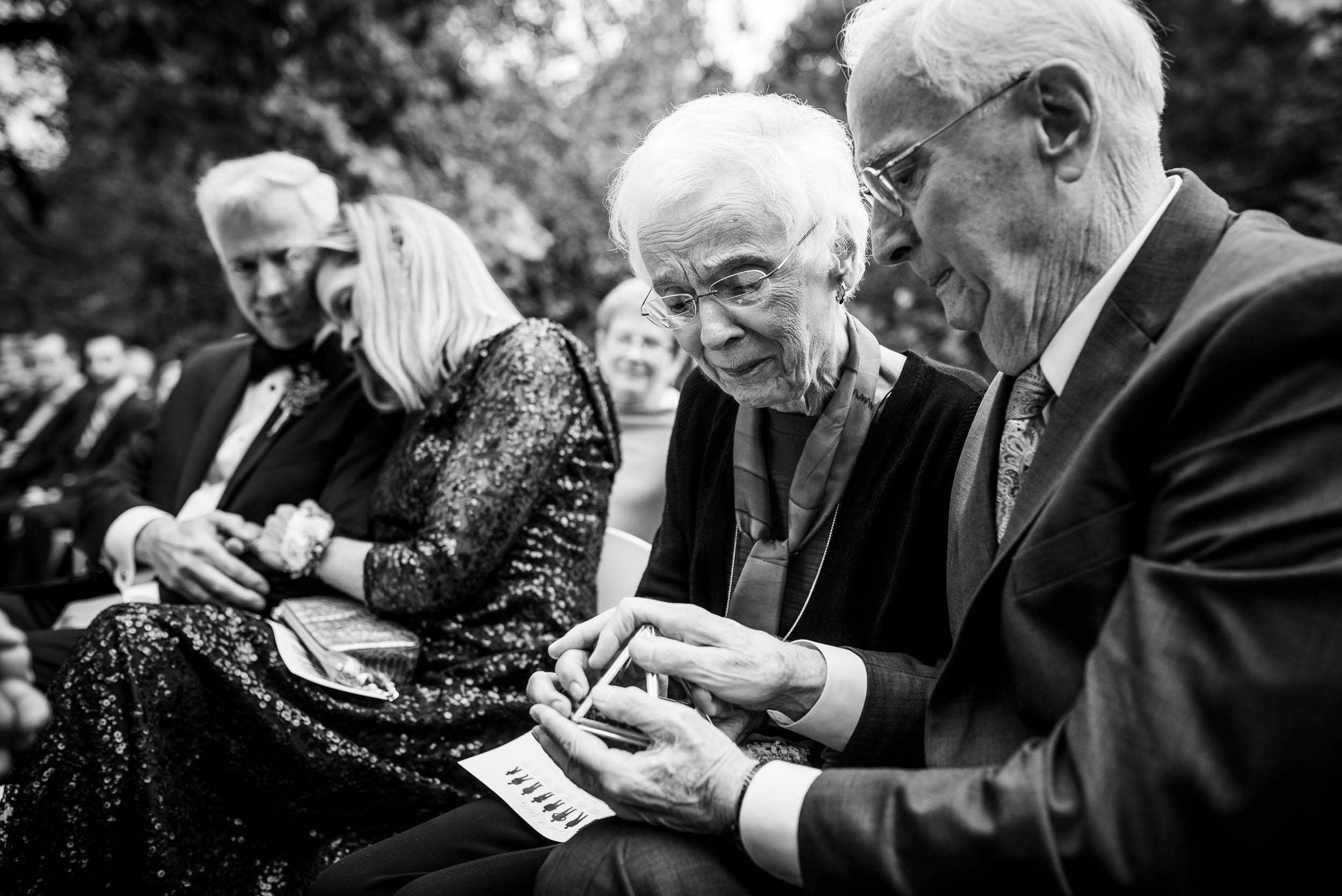 Grandparents partake in a ring warming ceremony during a Glessner House Chicago wedding.