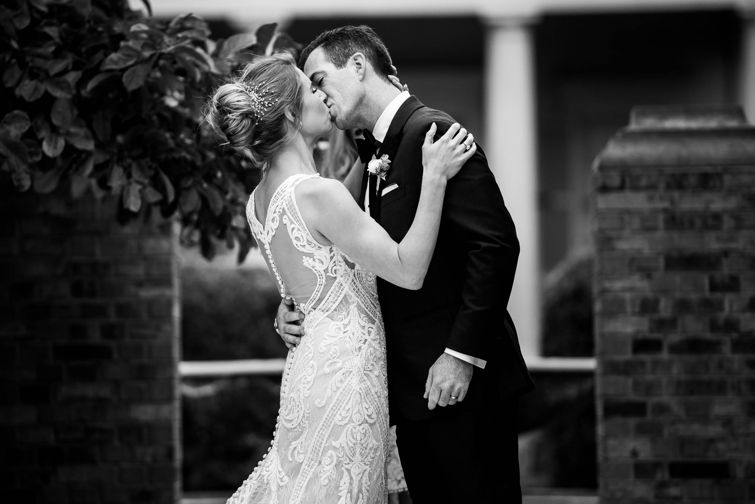 Bride and groom first kiss during a Glessner House Chicago wedding ceremony.