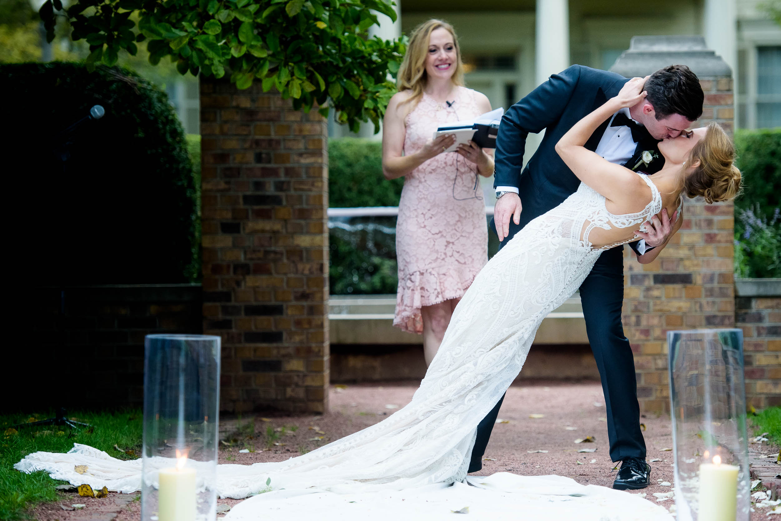 Groom dips the bride during a Glessner House Chicago wedding ceremony.