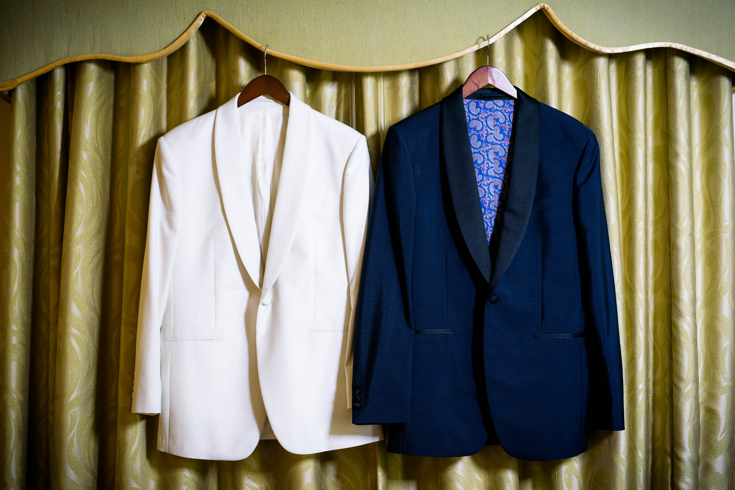 Grooms' suits for luxurious fall wedding at the Chicago Symphony Center captured by J. Brown Photography. See more wedding ideas at jbrownphotography.com!