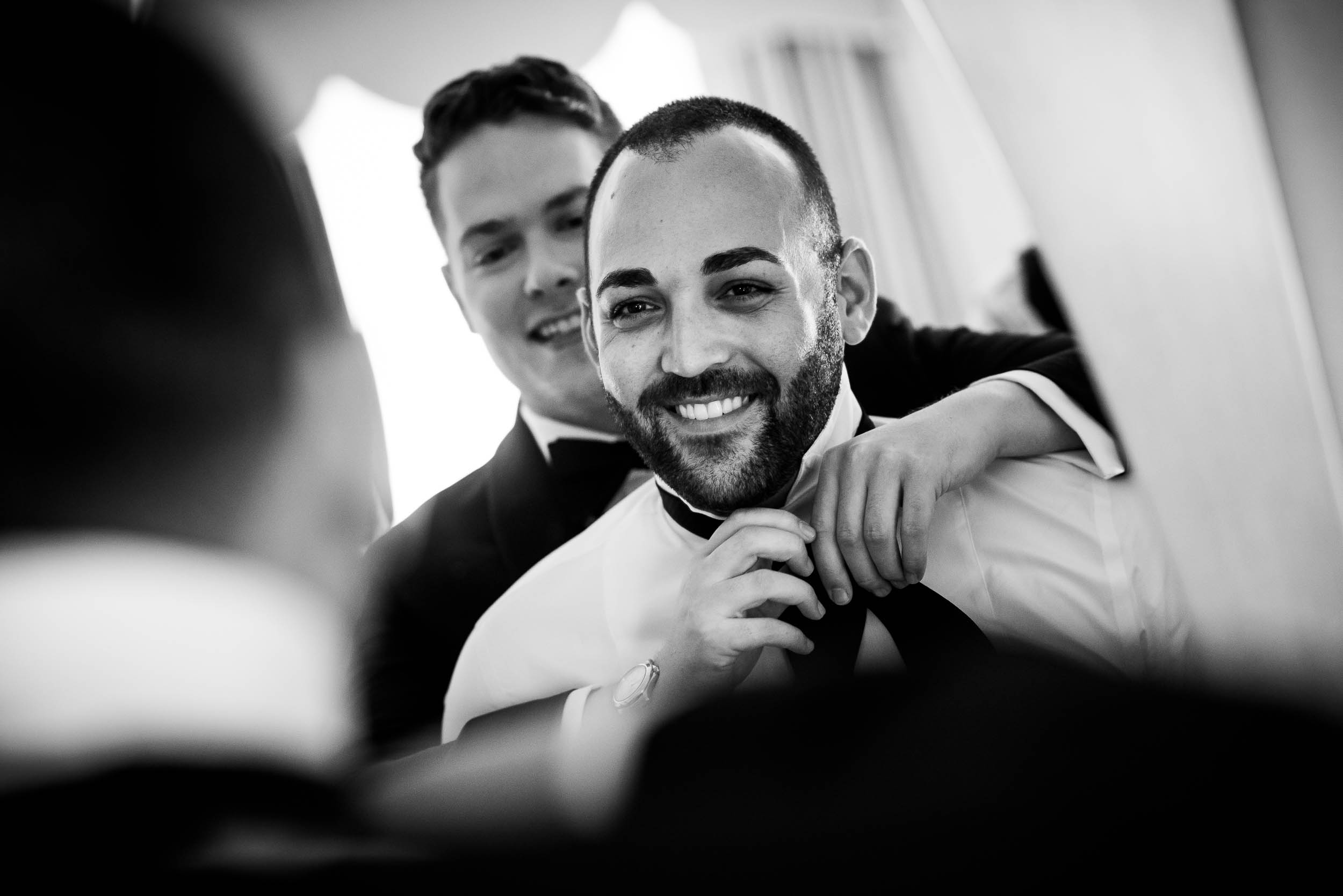 Grooms getting ready for luxurious fall wedding at the Chicago Symphony Center captured by J. Brown Photography. See more wedding ideas at jbrownphotography.com!