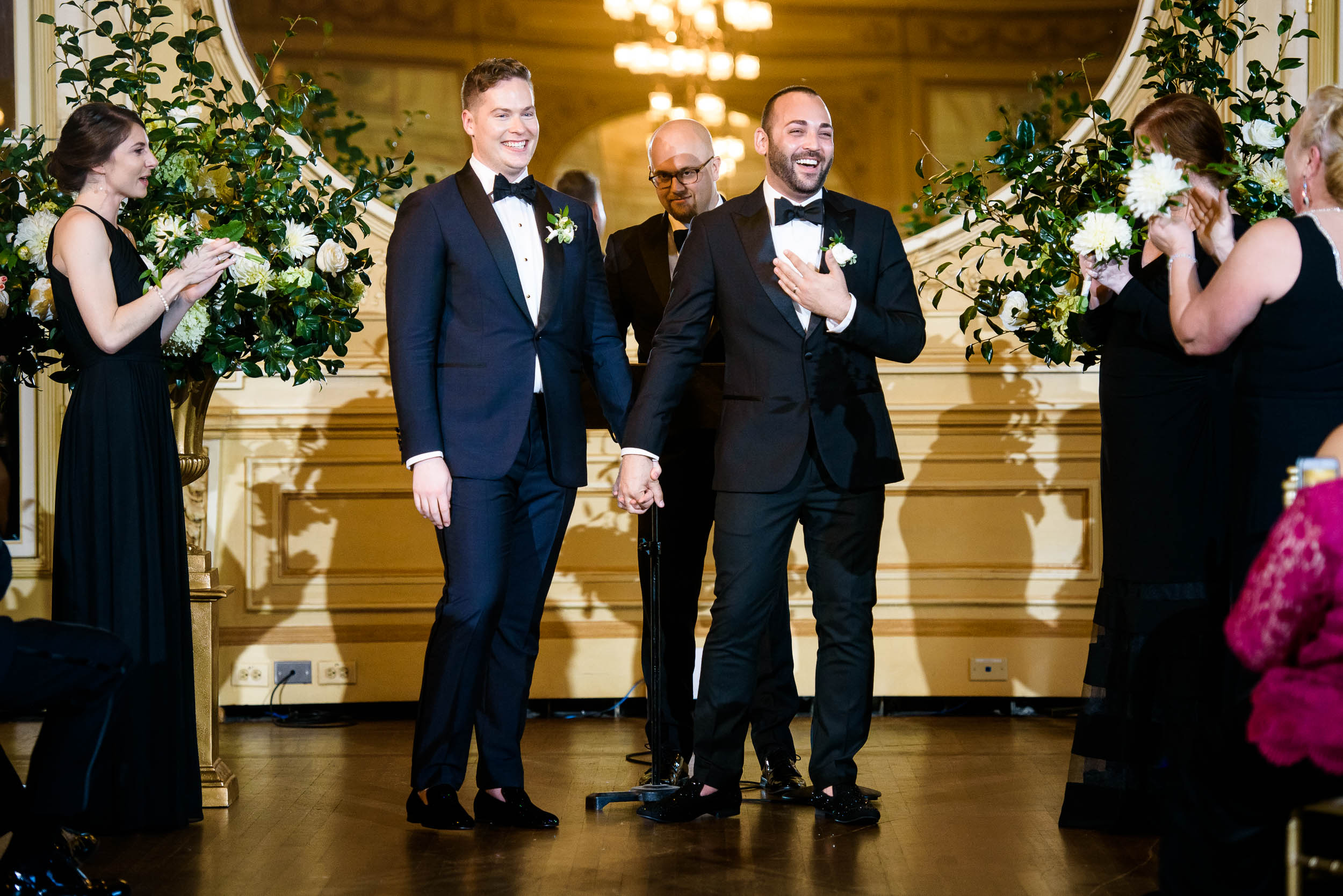Same-sex wedding ceremony for luxurious fall wedding at the Chicago Symphony Center captured by J. Brown Photography. See more wedding ideas at jbrownphotography.com!