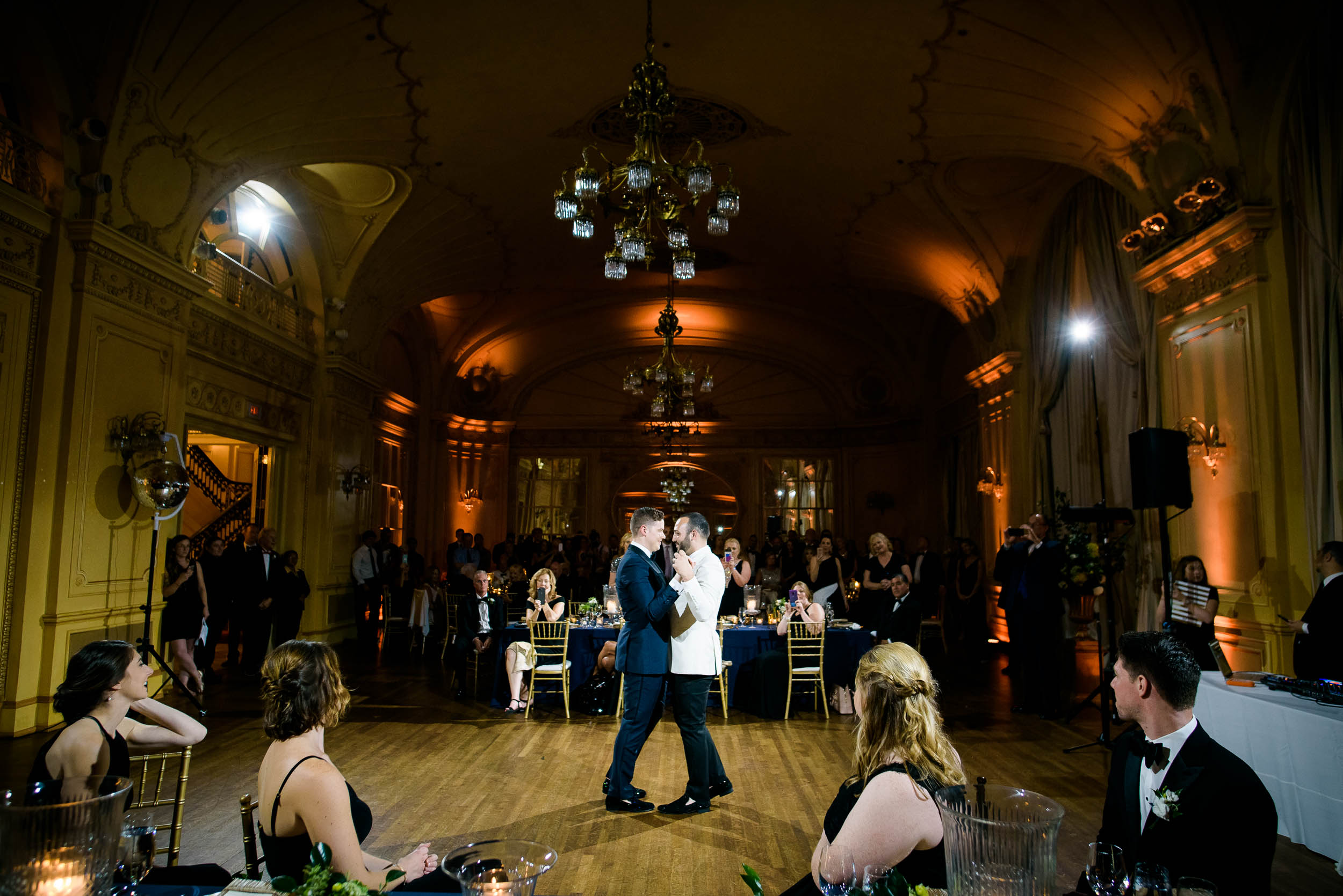 Grooms during first dance for luxurious fall wedding at the Chicago Symphony Center captured by J. Brown Photography. See more wedding ideas at jbrownphotography.com!