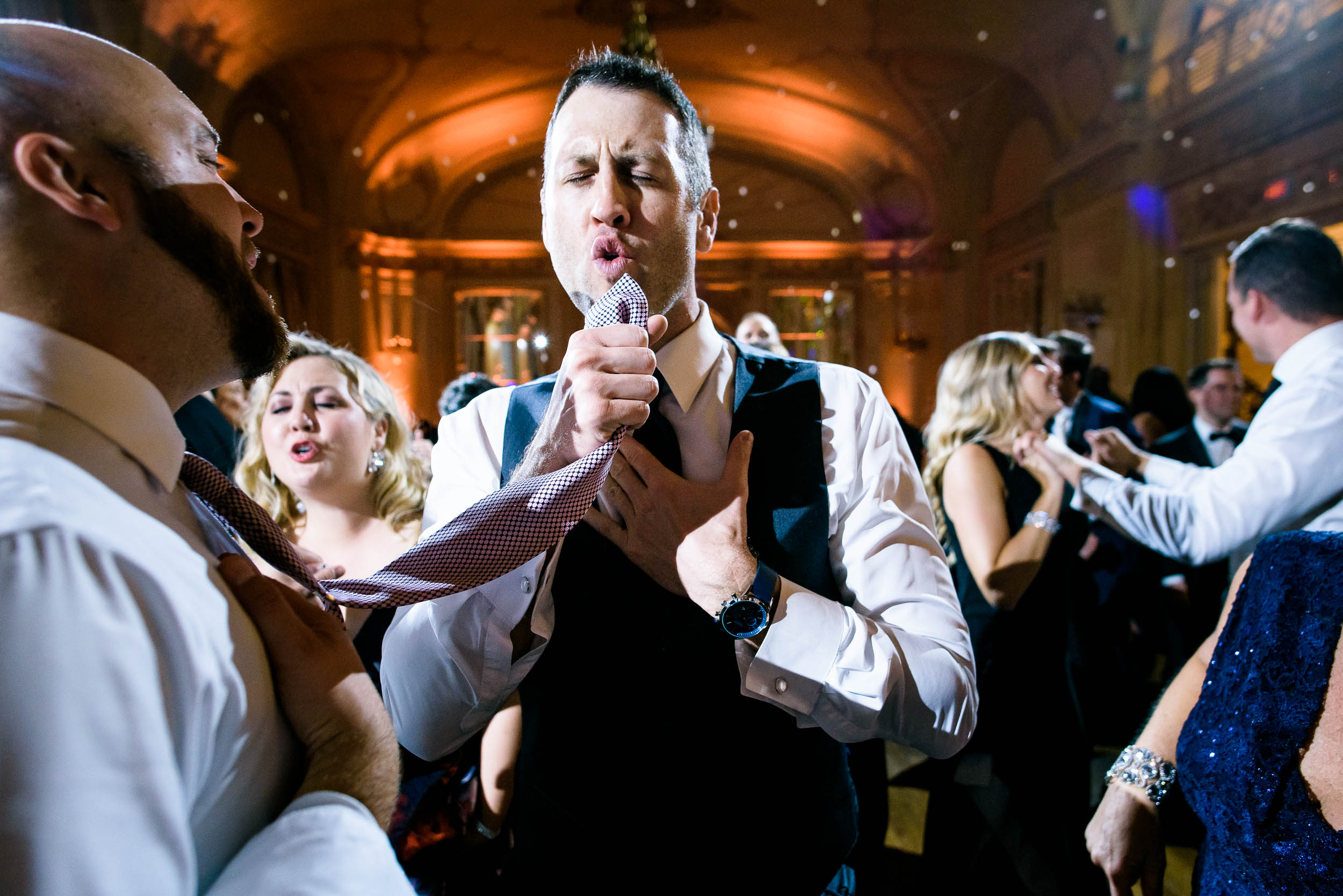 Wedding reception fun at luxurious fall wedding at the Chicago Symphony Center captured by J. Brown Photography. See more wedding ideas at jbrownphotography.com!