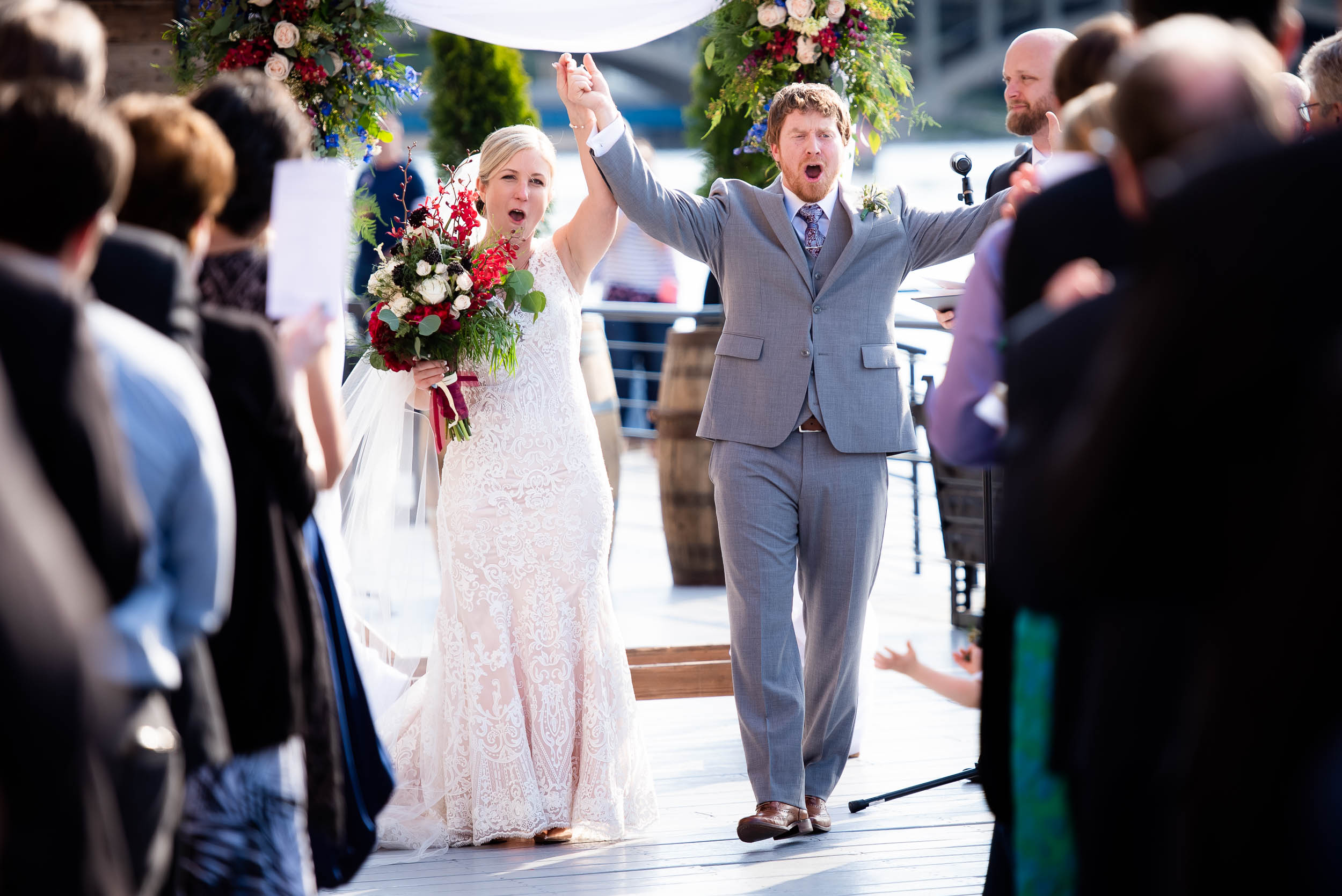 Wedding ceremony exit: Modern industrial Chicago wedding inside Prairie Street Brewhouse captured by J. Brown Photography. Find more wedding ideas at jbrownphotography.com!