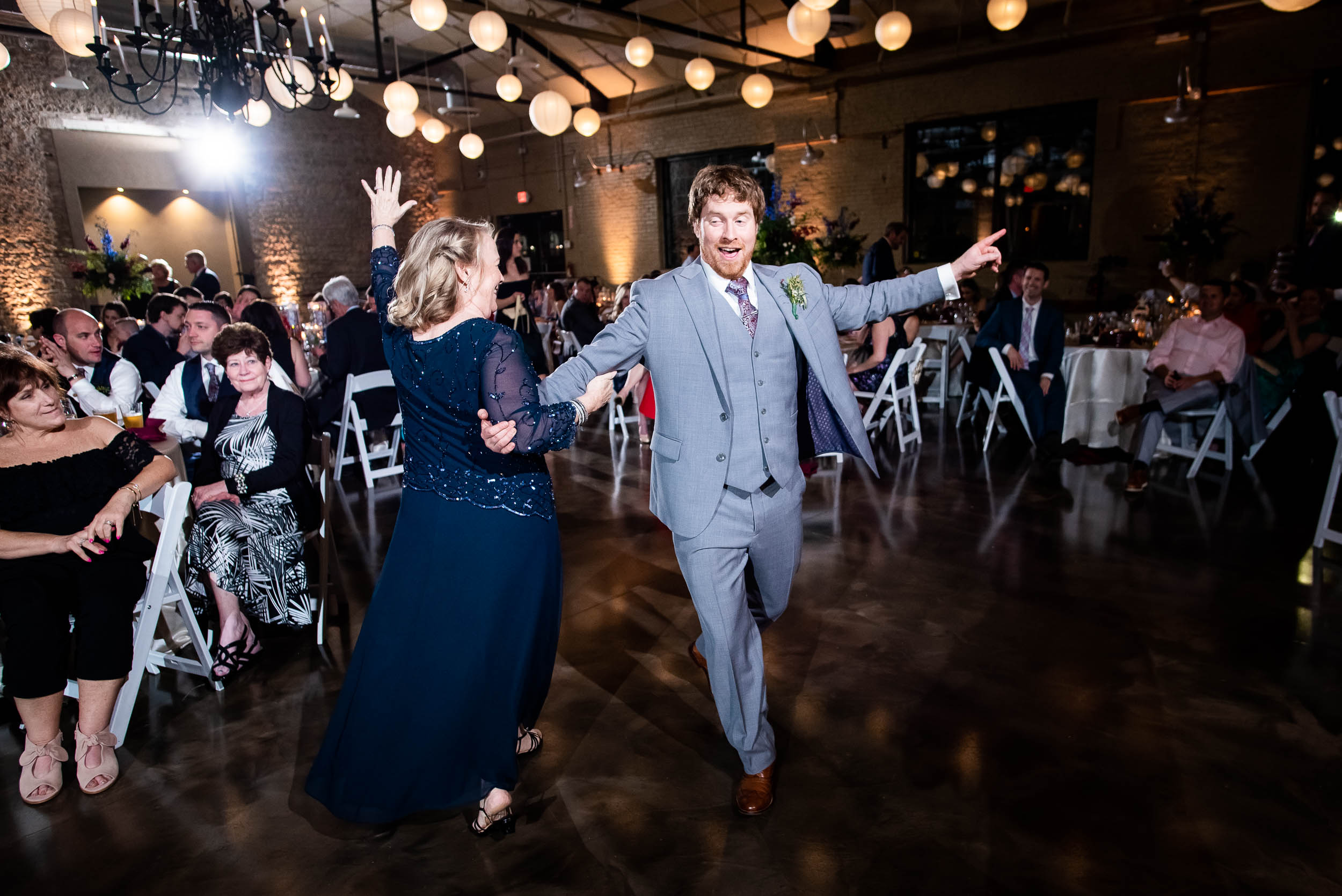 Mother/son dance: Modern industrial Chicago wedding inside Prairie Street Brewhouse captured by J. Brown Photography. Find more wedding ideas at jbrownphotography.com!